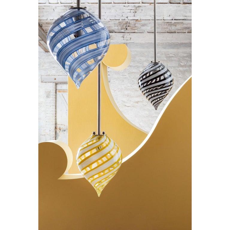 Set of 3 Canne Balloon pendant light by Magic Circus Editions
Dimensions: H 36 + rod length to order x W 27 cm
 Glass height 36 cm
Materials: Fluted brass, mouth blown glass
Available finishes: brass, nickel

All our lamps can be wired
