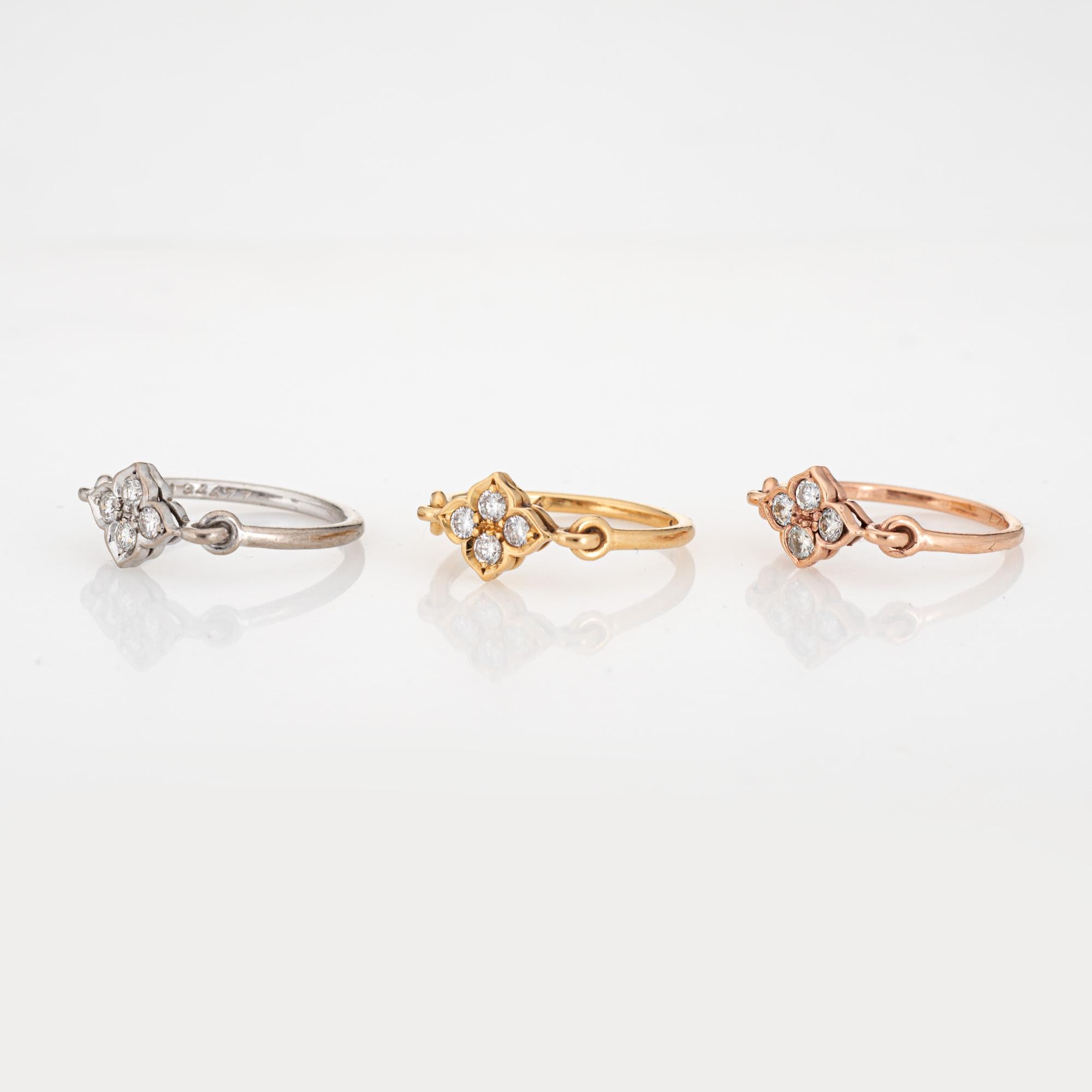 Pre owned set of 3 Cartier Hindu diamond rings crafted in 18 karat white, rose and yellow gold.  

Twelve round brilliant cut diamonds (4 per ring) total an estimated 0.36 carats (estimated at F-G color and VVS2 clarity).

The out of production