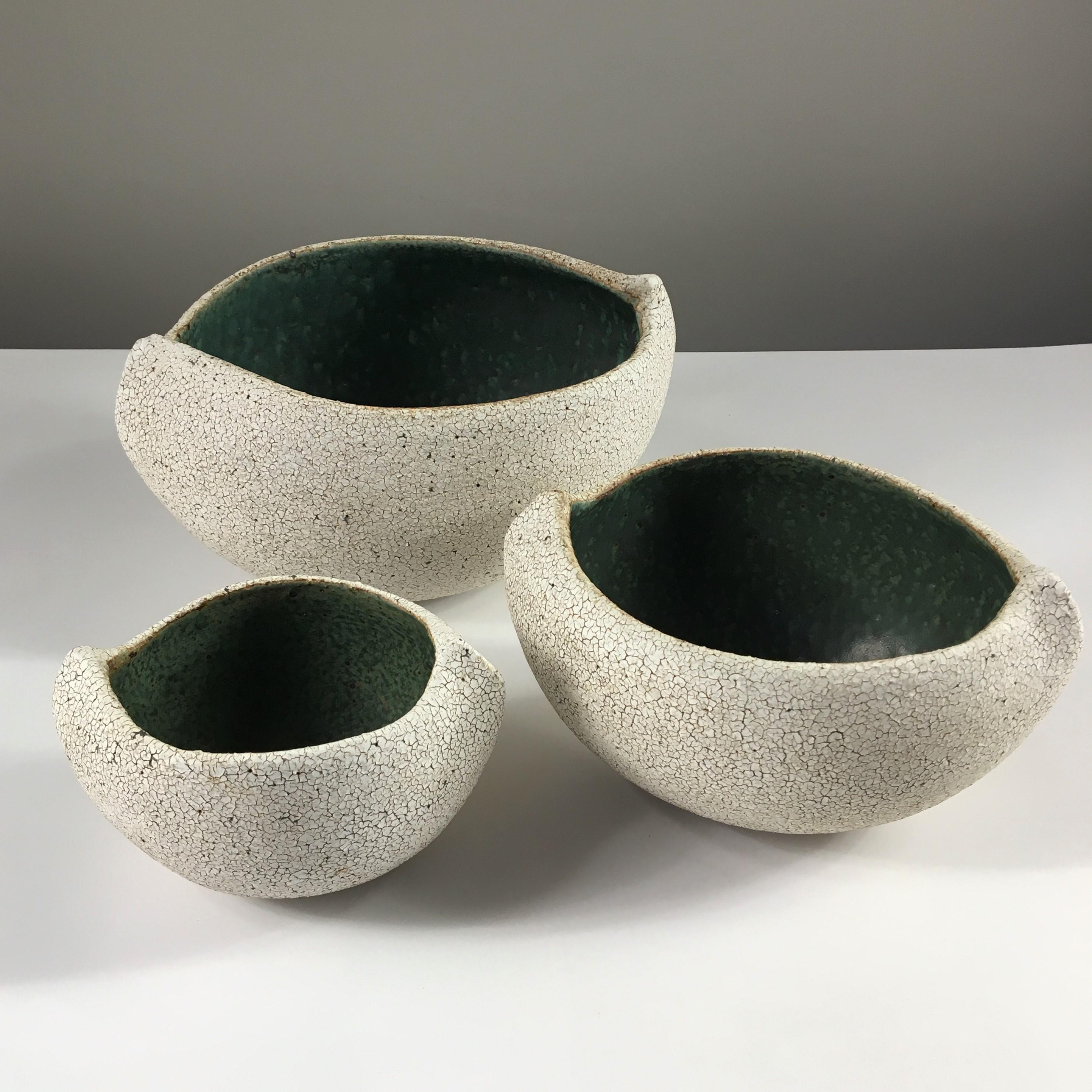 Set of 3 ceramic boat shape bowls by Yumiko Kuga. Measures: W 6