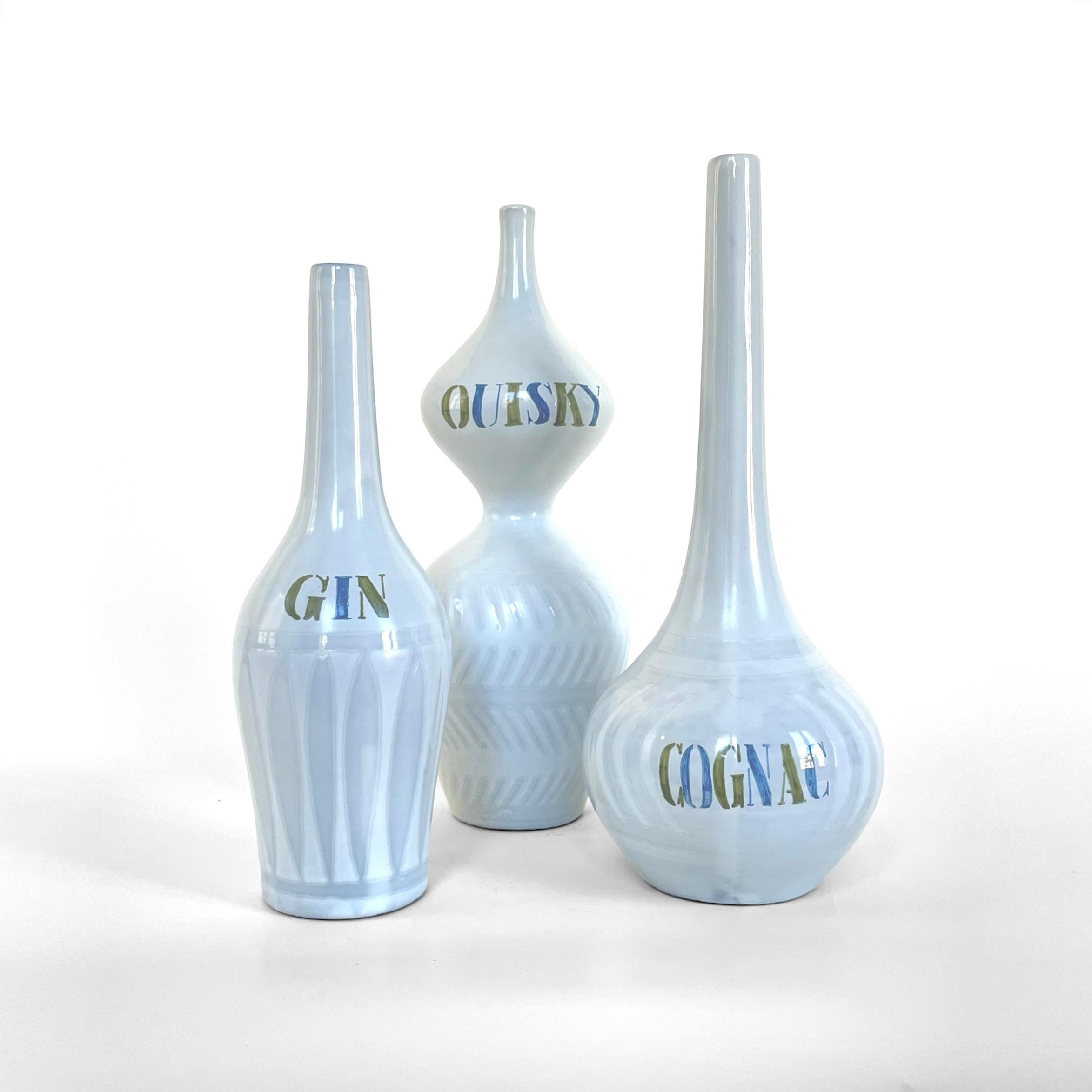 Set of 3 ceramic alcohol bottles by roger capron, vallauris, circa 1960. 
Bottle 