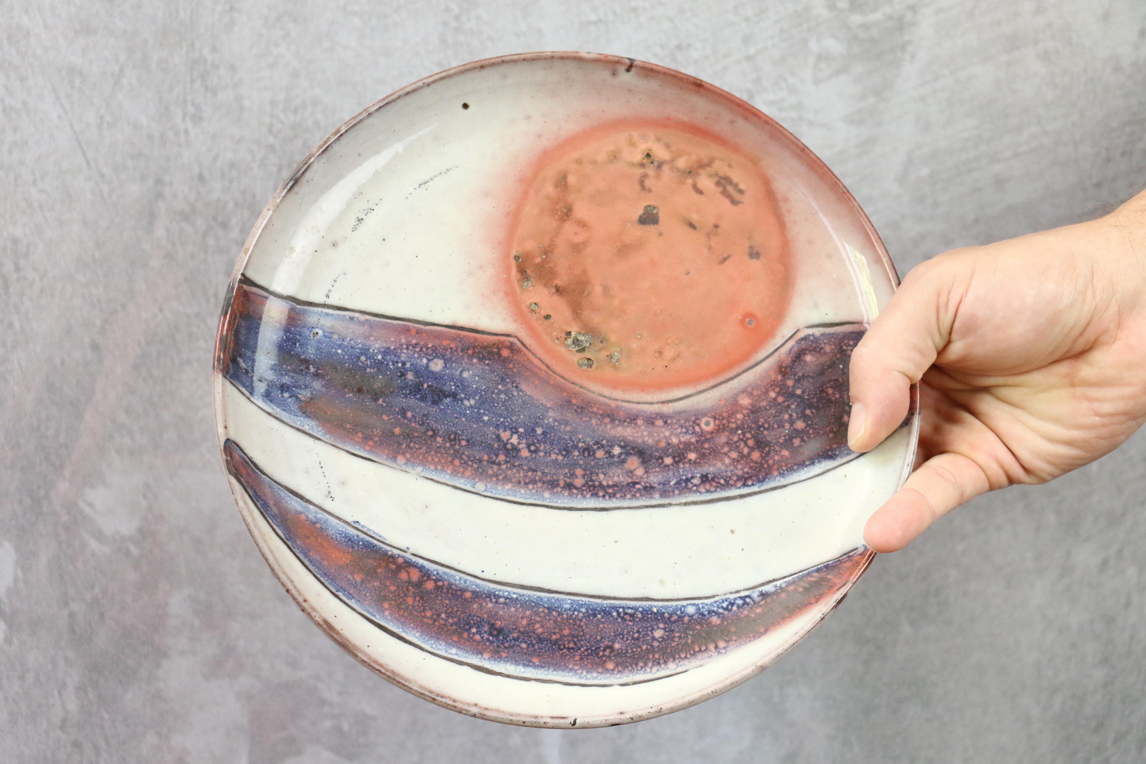 Set of 3 ceramic plates by Robert Chiazzo, era Jouve, Ruelland

Robert Chiazzo (1924 - 2020) was a French painter and ceramist.

Pastry chef, farm worker, then house painter, he enlisted during the Second World War, becoming a parachutist with the