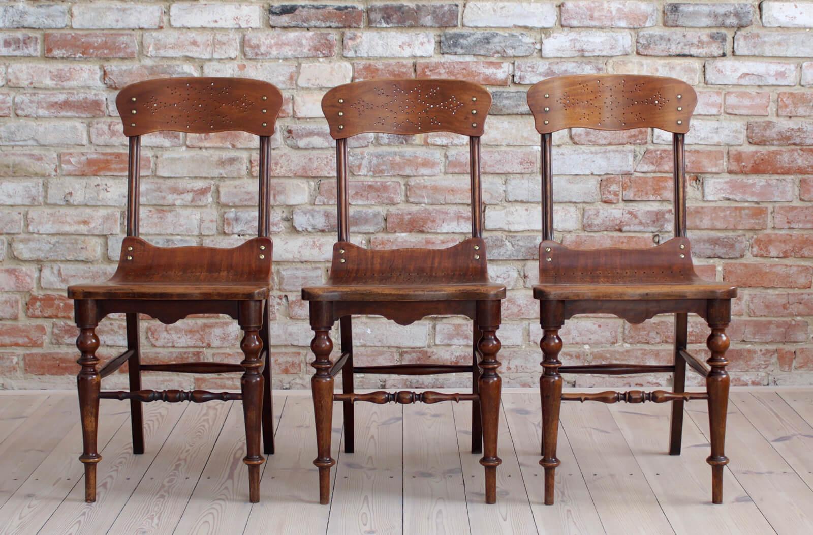 Set of 3 plywood chairs from early 20th century. The chair is set on wooden frame and has a profiled one-piece seat-back element made of plywood with incredibly detailed and beautiful patterns. It is a very unique object, most likely it served at a