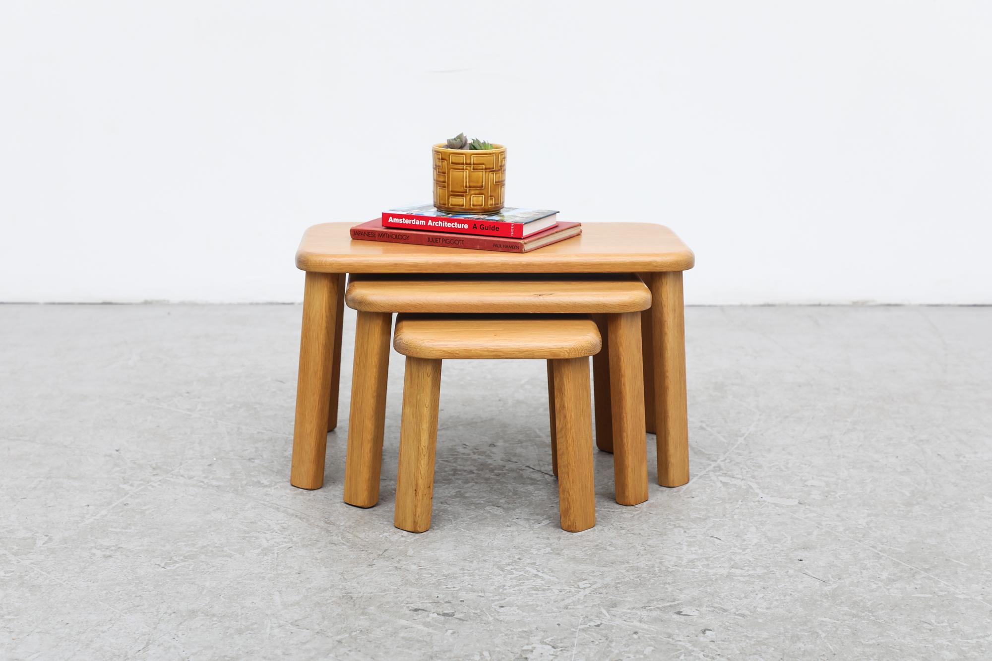 Set of 3 Charlotte Perriand Inspired blonde solid oak rectangle nesting tables with rounded edges and smooth finish. In original condition with visible wear, consistent with its age and use.