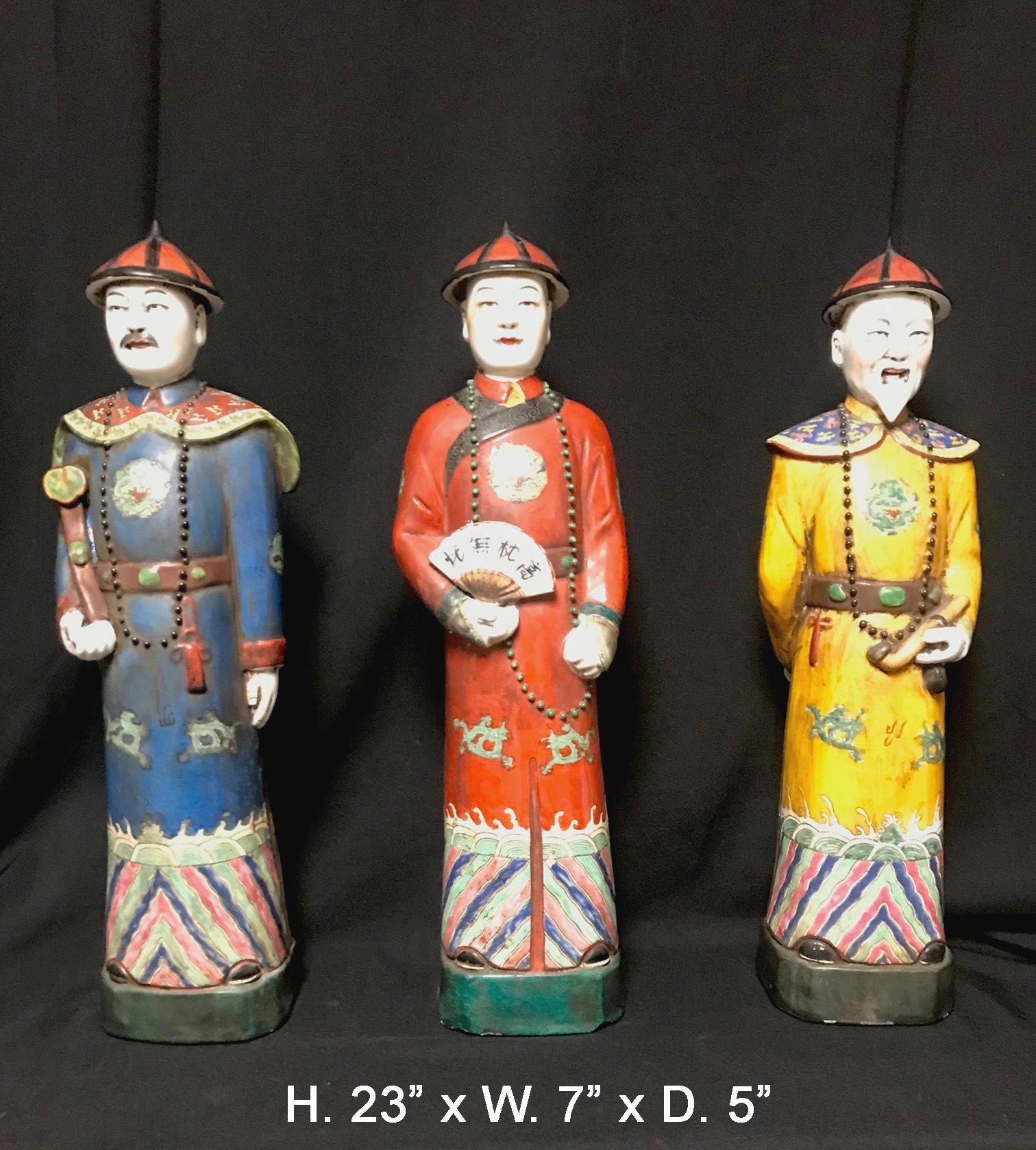 Attractive set of three Chinese hand painted porcelain figures of the three Immortals and dressed in traditional garments and hats. 
Second half of the 20th century.

Each fully poly-chromed and paint-decorated.