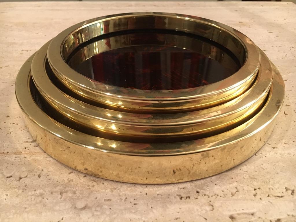 Set of 3 faux tortoise and brass circular trays by Christian Dior Home
3 sizes:
- 21 cm
- 18.5 cm
- 16 cm.
 
