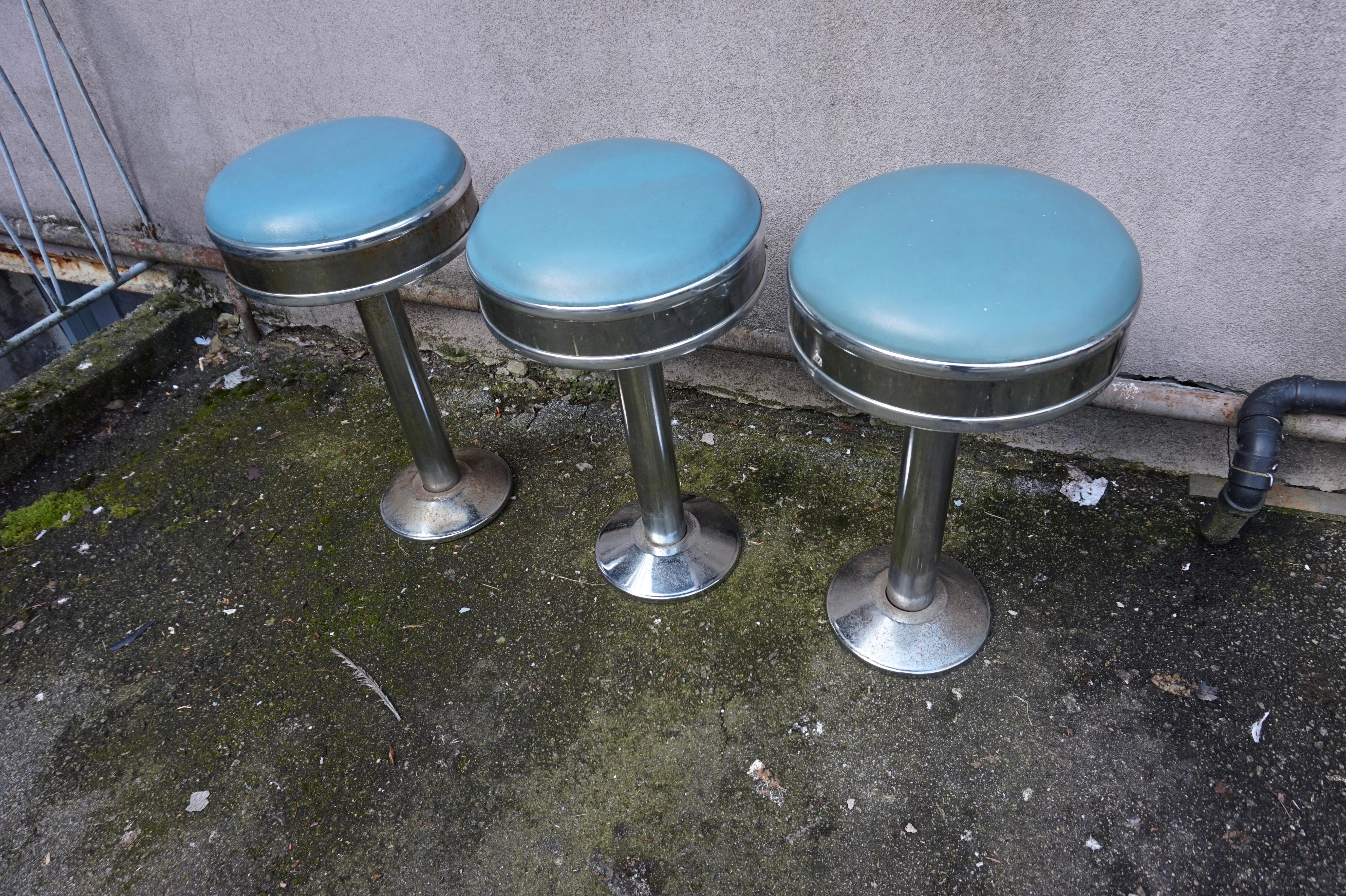 Beautiful and authentic Art Deco diner cum barstools. Chrome is overall in good shape but pitting consistent with age is present. These have not been restored and if you are looking for a touch of originality these will stun. The seats are in good