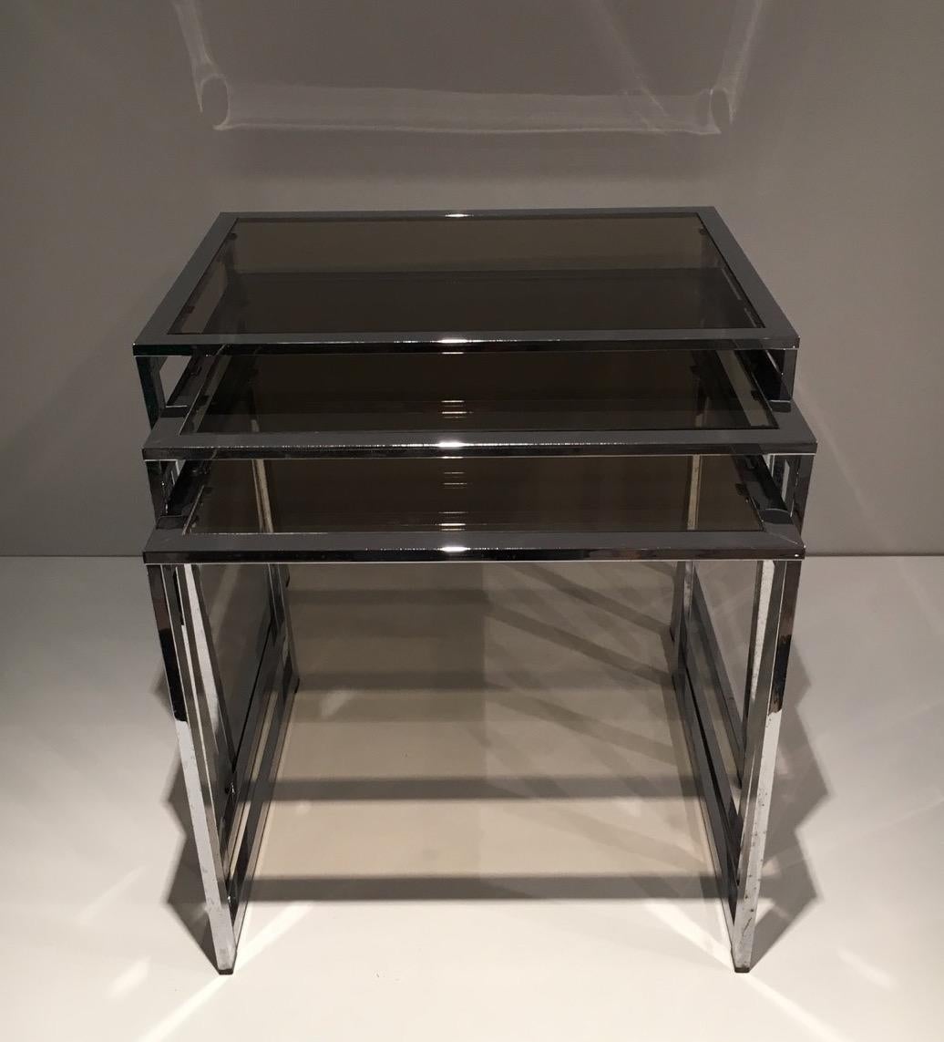 Mid-Century Modern Set of 3 Chromed Nesting Tables with Smoked Glass Shelves, French Work, Circa 19 For Sale