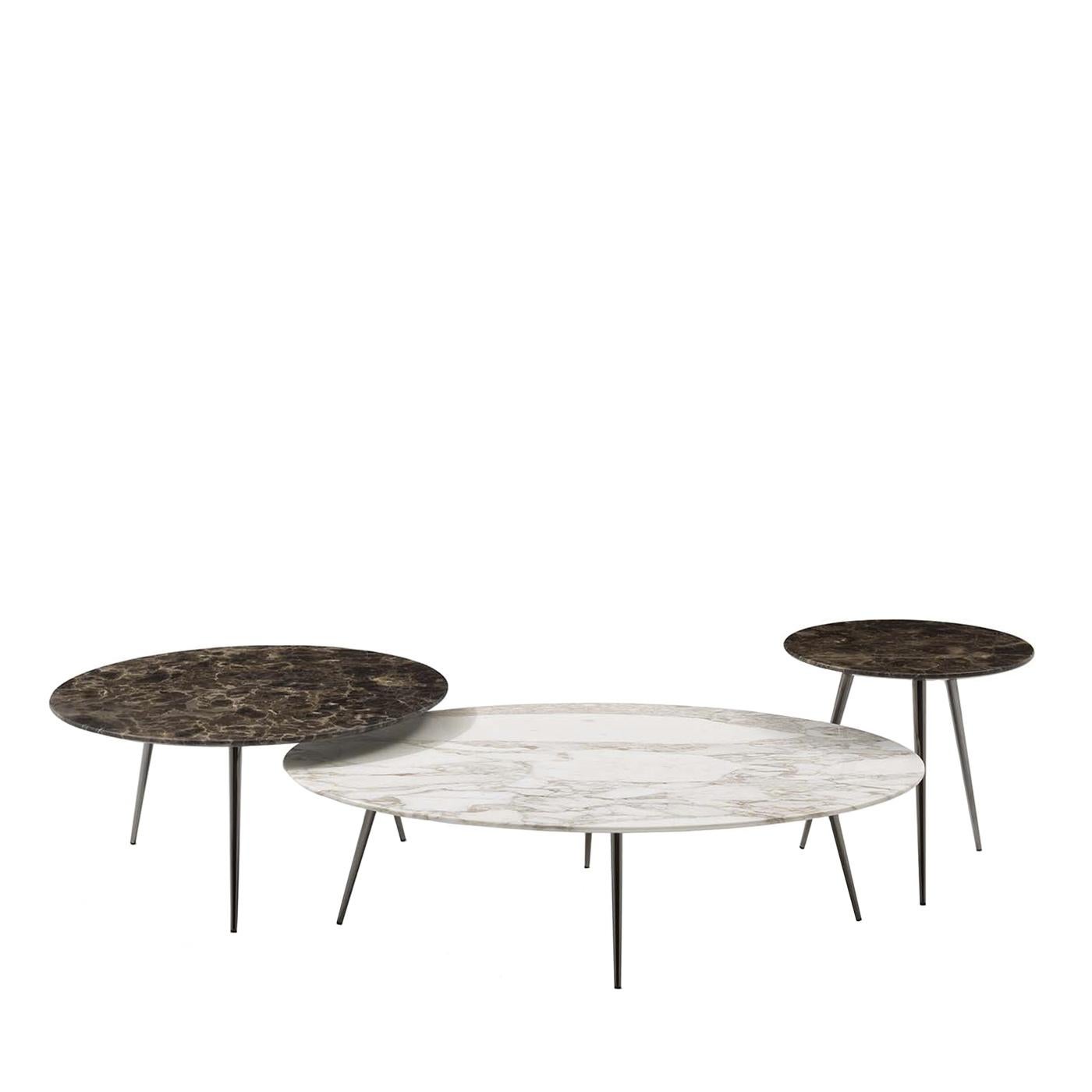 Part of a collection named after the glamorous decades of the 1950s, this set of three coffee tables will make a statement in a modern living room, adding a retro-chic accent either in a cluster or positioned in different areas. The typical