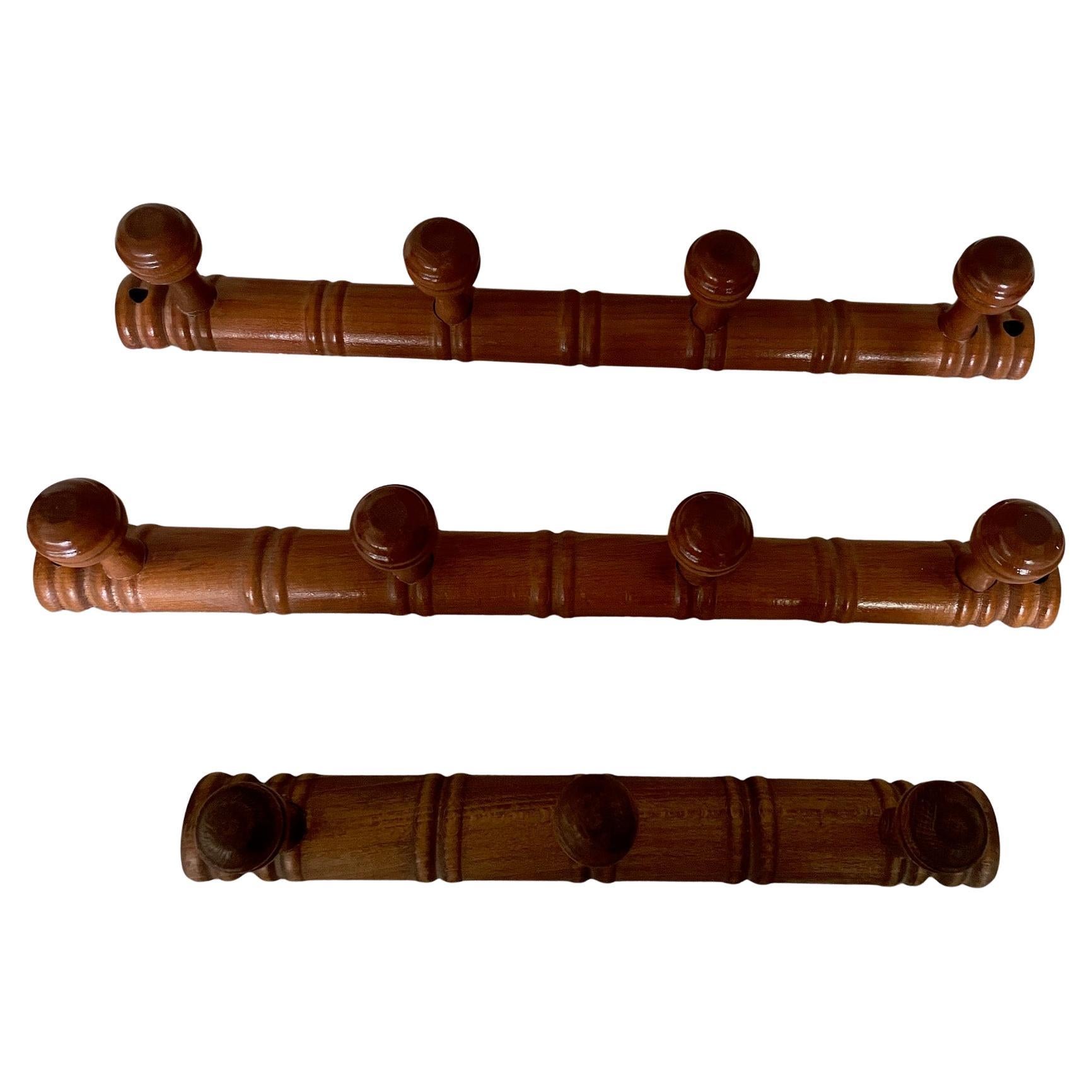 Set of 3 coat hangers en vente