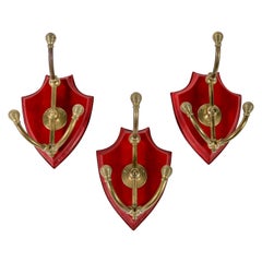Juego de 3 percheros de piel cosida de Jacques Adnet