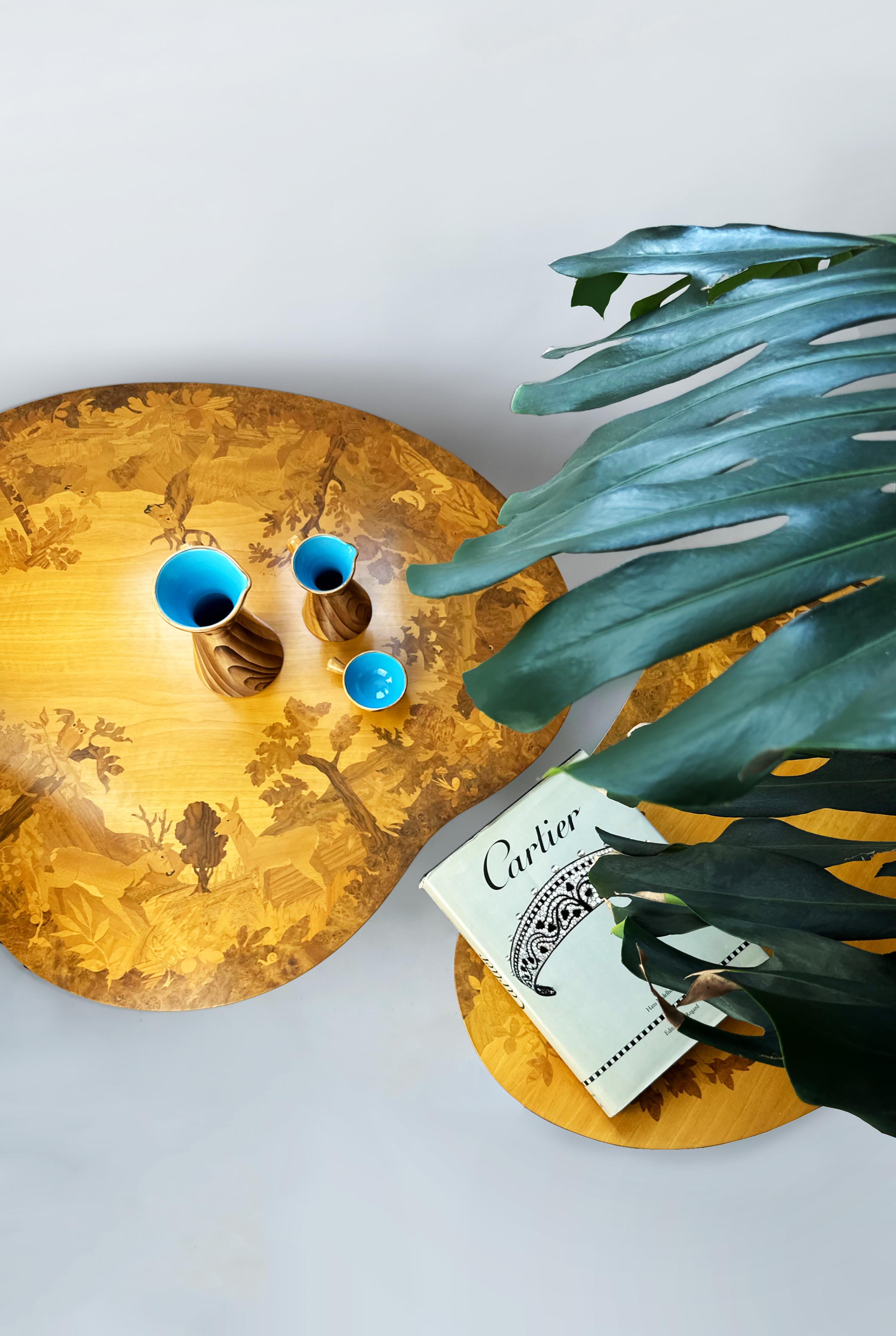Introducing a rare and exquisite Set of Kidney-Shaped Coffee Tables and larger coffee table by Buchschmid & Gretaux, Germany, from the 1950s. These remarkable mid-century modern pieces are a true testament to the exceptional craftsmanship and