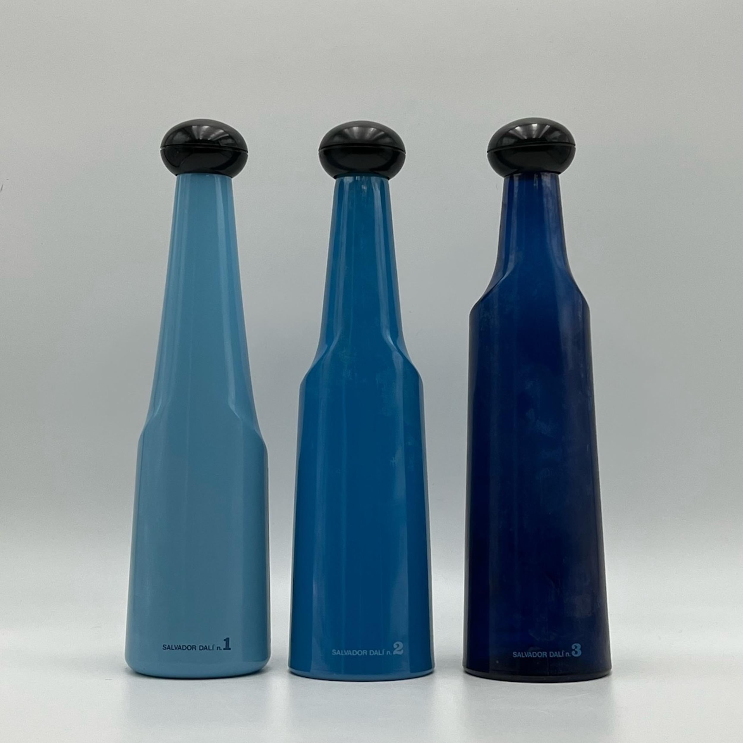 Vetro Set di 3 bottiglie di vetro da collezione anni '70 Salvador Dali Rosso Antico