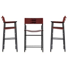 Set di 3 sgabelli da bar contemporanei w. Schienale in pelle cognac e gomma nera in metallo