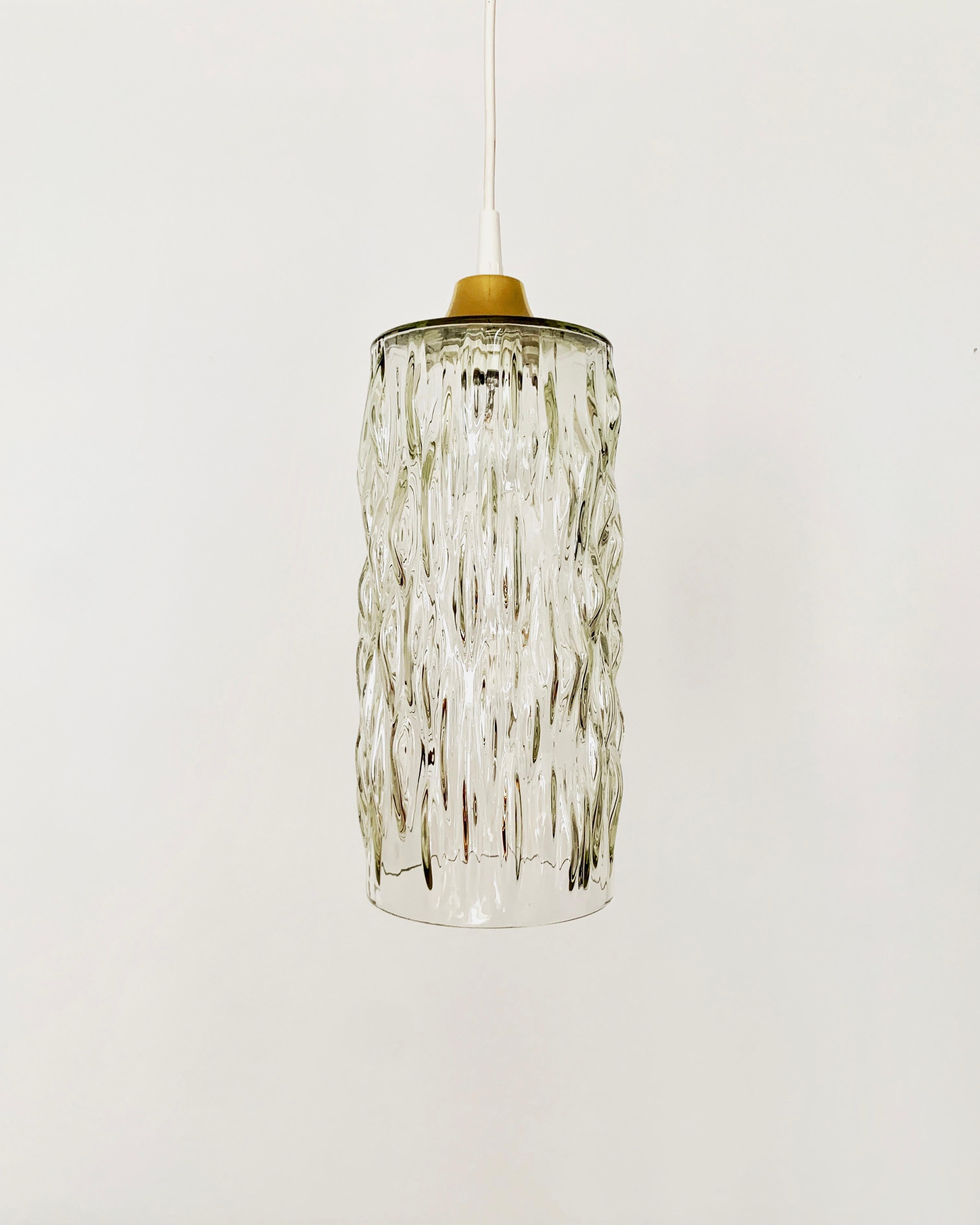 Very beautiful and crystal glass pendant lamps from the 1950s.
Wonderful mouth-blown glass with a great structure.
The design and the materials used create a great glittering light.
A stunning lamp and a real addition to any