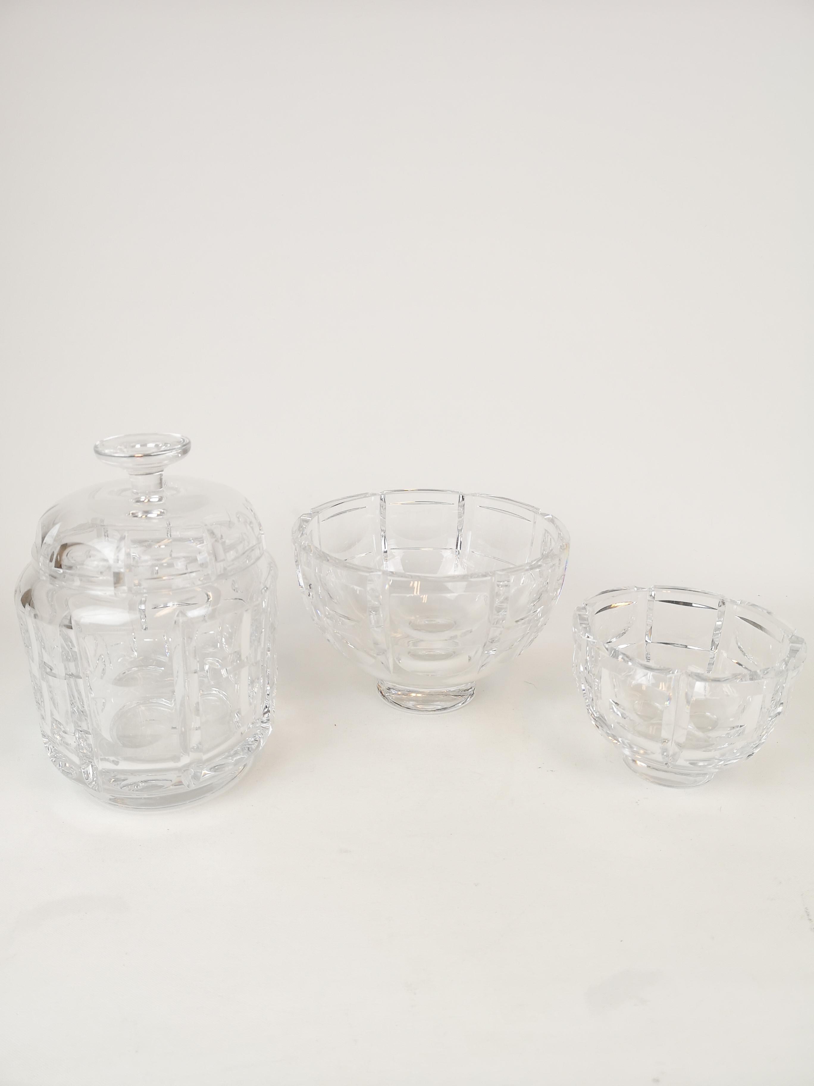 These three pieces from Orrefors Sweden where designed by Simon Gate in the 1930s. The name of them are 