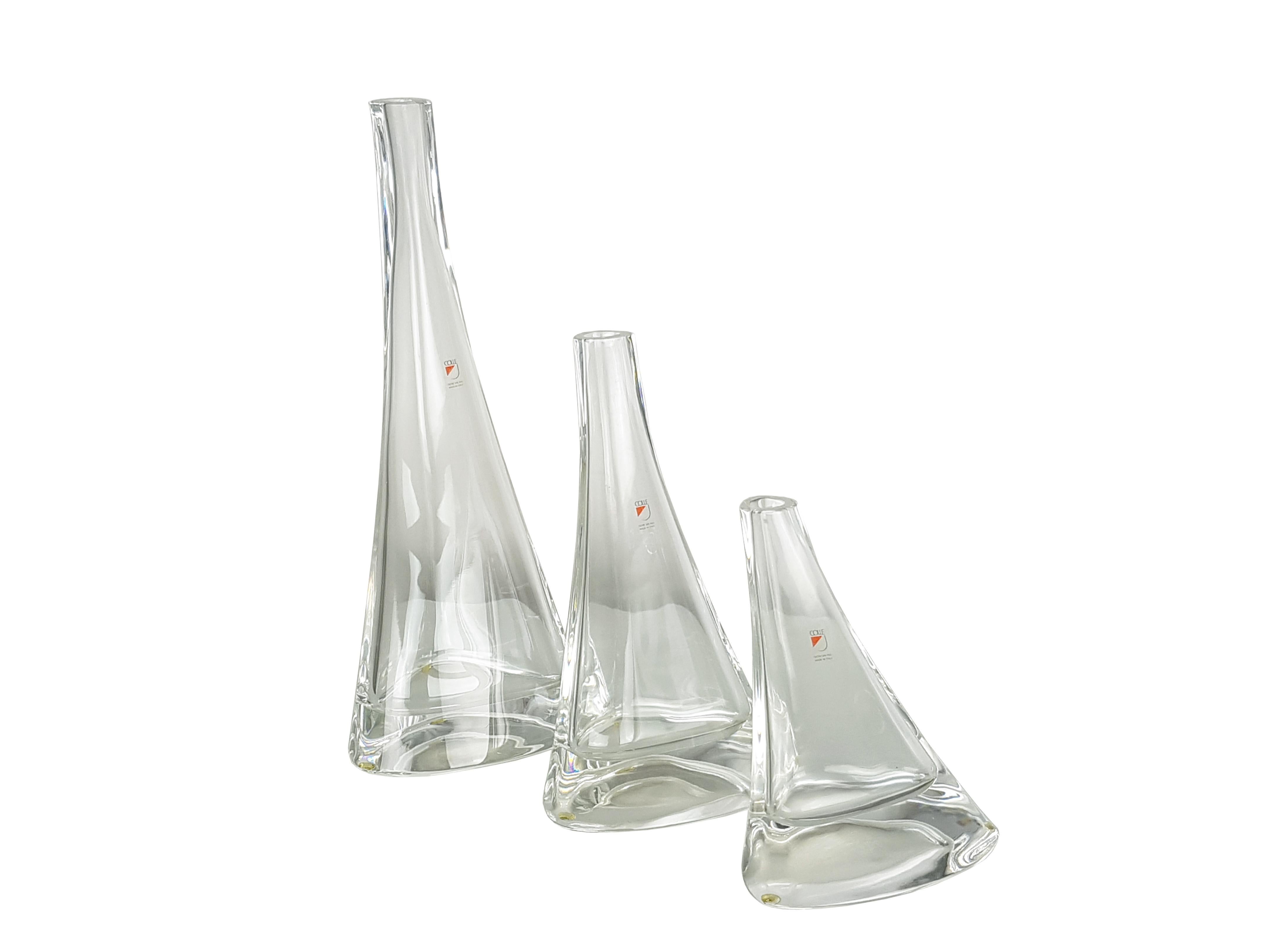 Set of 3 soliflower vases designed by Mangiarotti for Colle, a Tuscany glass manufacturer. This set belongs to an extensive collection of vases and tableware produced in the 1980s.
Very good condition. Sign of the maker printed on the