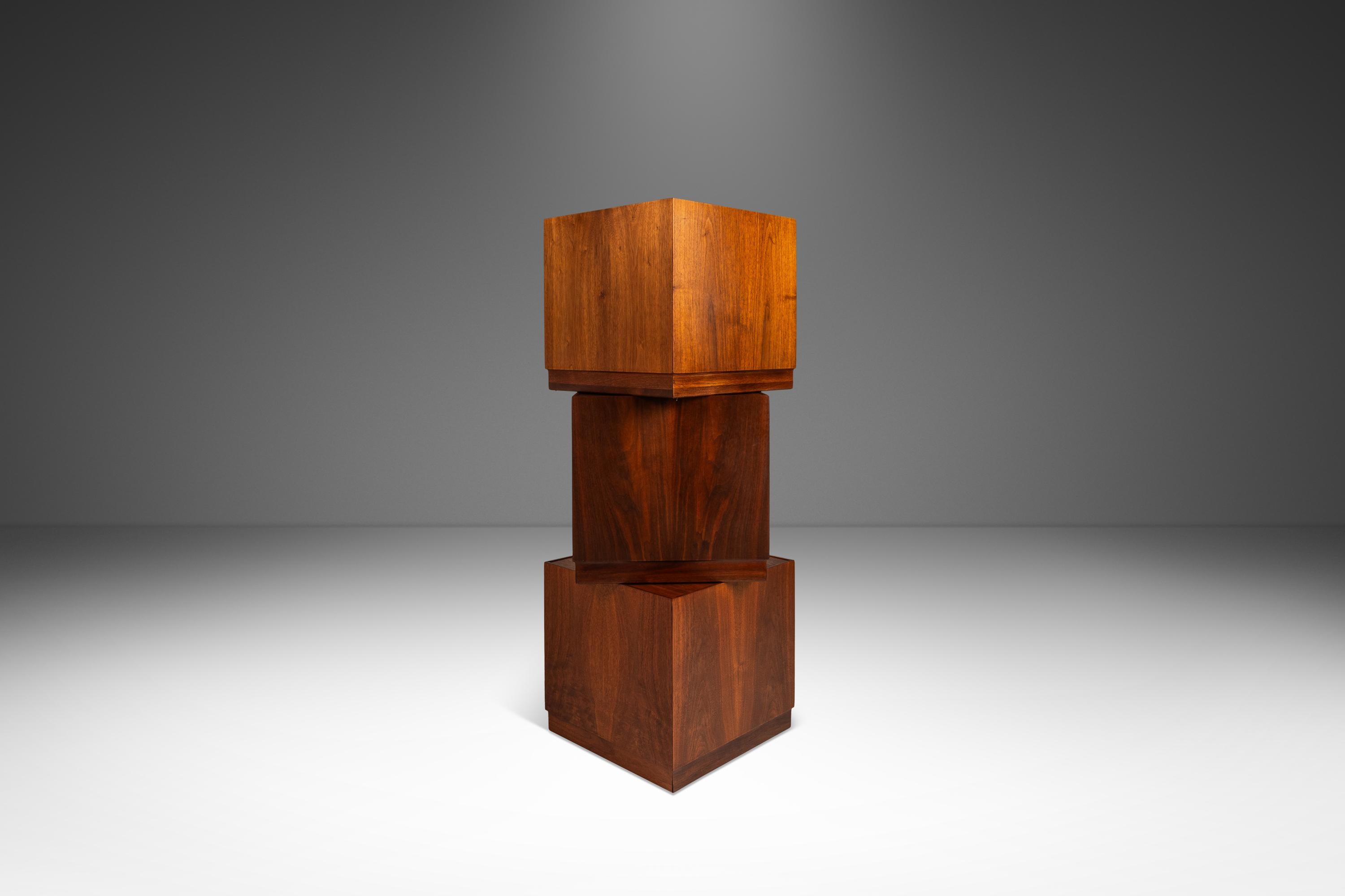 Introducing a rare set of three Modernist Cube end tables designed by the influential Jack Cartwright for Founders. Simultaneously monolithic and petite, regal yet understated this incredible set of end tables are in stunning original condition.