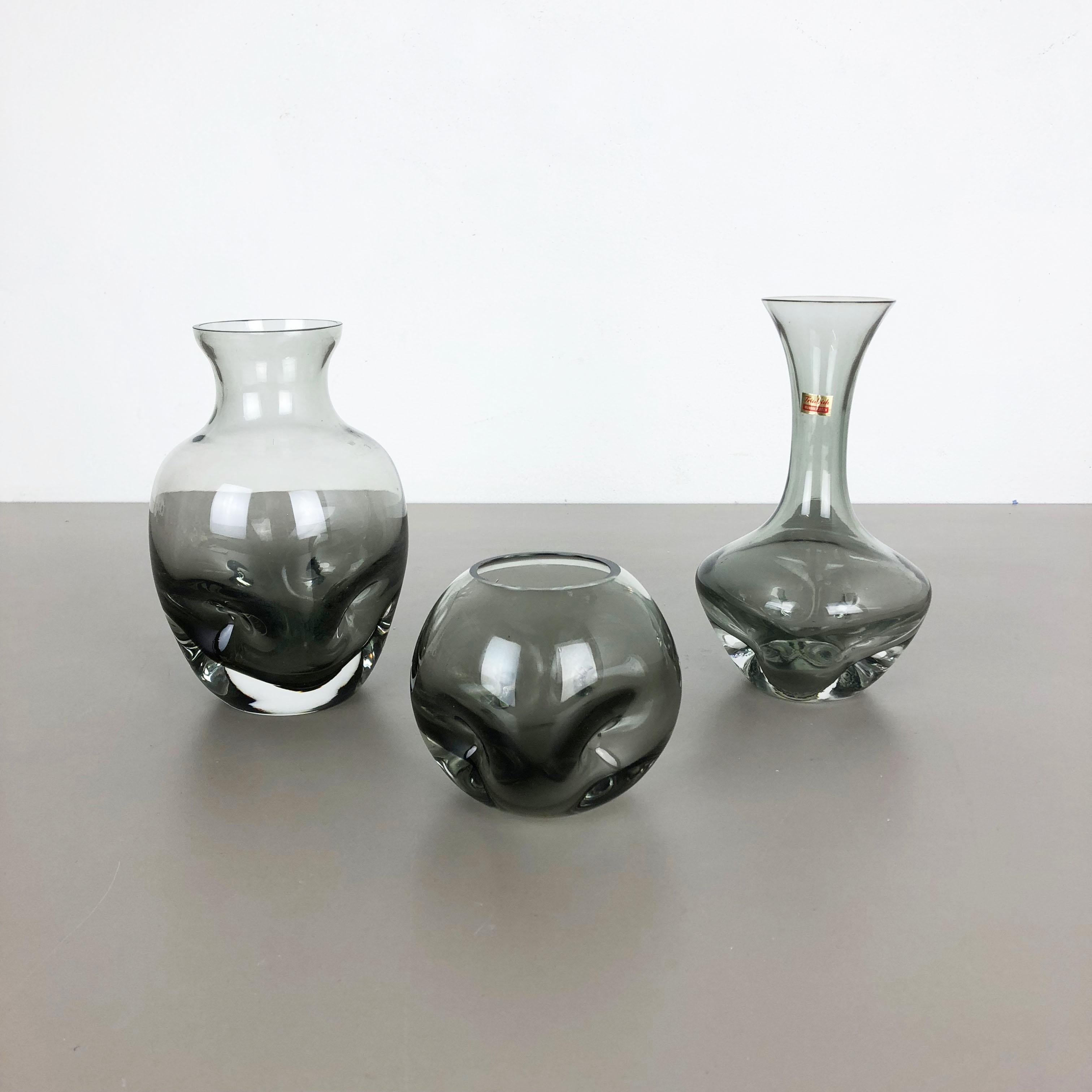 Article:

Glass vases set of 3


Producer:

Friedrich Kristall, Germany



Decade:

1970s


Original super rare vintage Vase set designed and produced by German high quality glass producer Friedrich Kristall, Germany. The vase