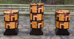 Set of 3 cylindrical, lacquered, Art Deco style wooden chests of drawers, 1930s