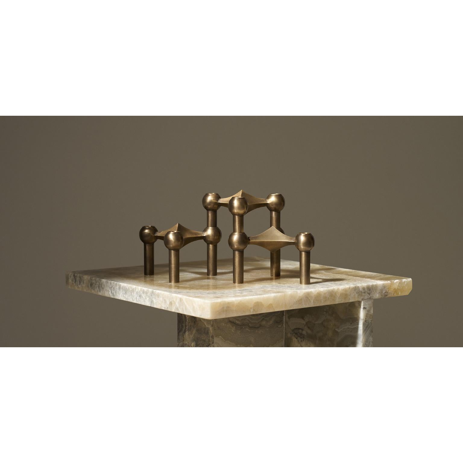 Set de 3 Portavelas Decorativos de Latón Bronceado by STOFF Nagel
Dimensiones: Ø 10,2 x A 6,9 cm. 
Materiales: Latón.

Disponible en diferentes opciones de acabado:  latón cepillado, cromo cepillado, latón bronceado, cromo, latón macizo, negro,