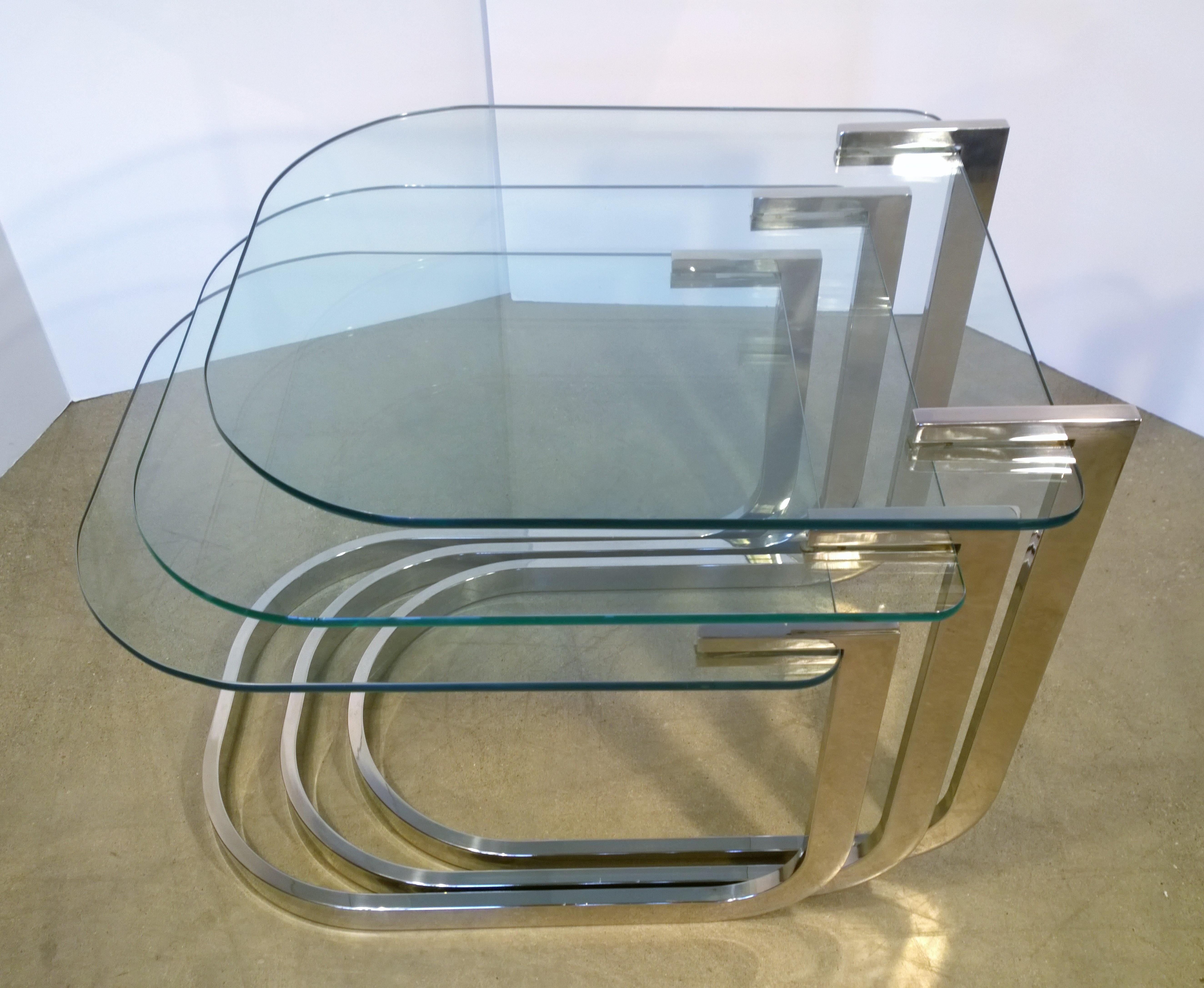 American Set of 3 Design Institute America Horseshoe Shaped Chrome & Glass Nesting Tables For Sale