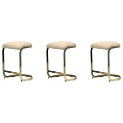 Set di 3 sgabelli Design Institute of America in ottone e Bouclé bianco avorio, 1980 ca.