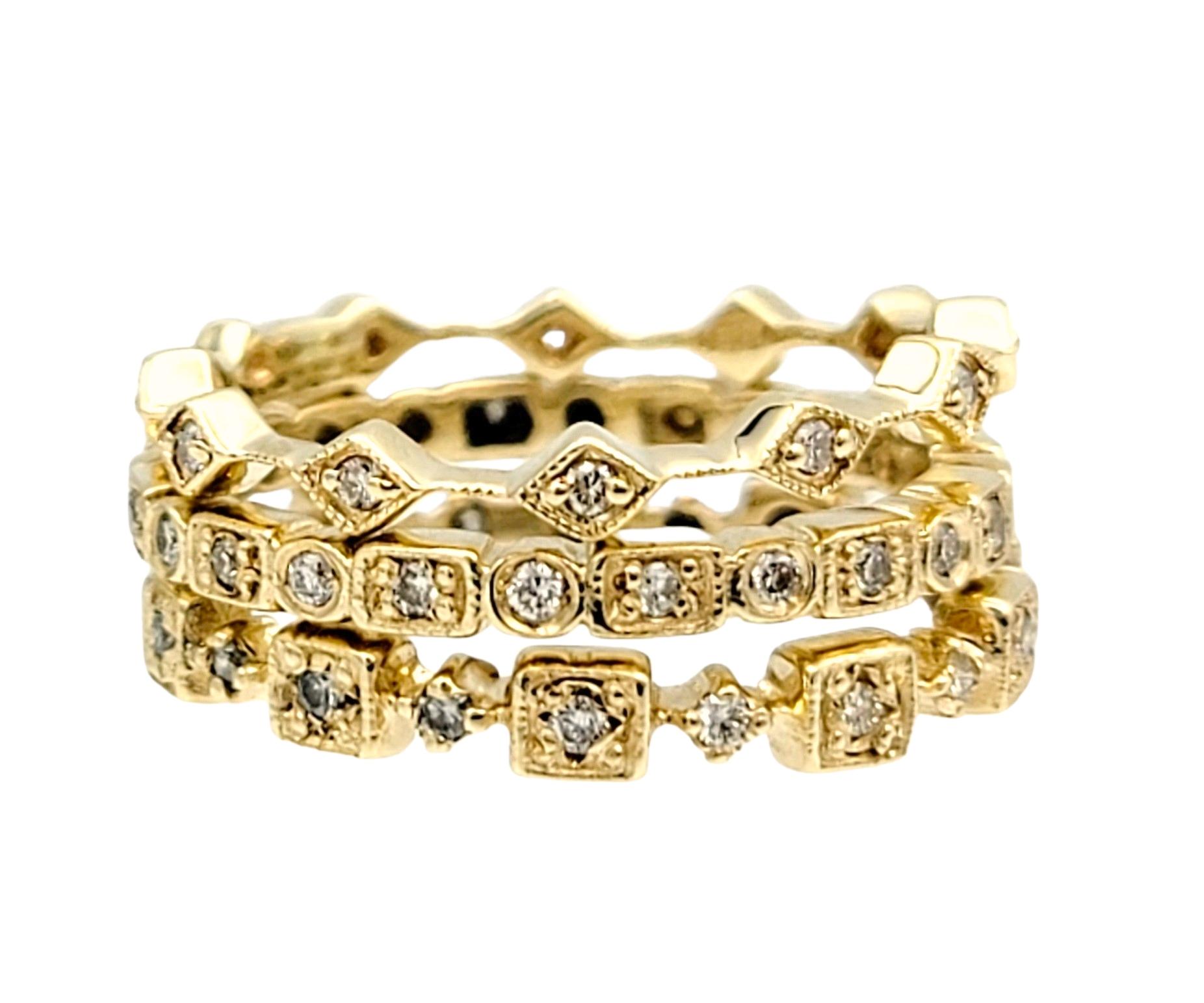 Contemporary Set of 3 Diamond Eternity Milgrain Stacking Band Rings in 14 Karat Yellow Gold For Sale
