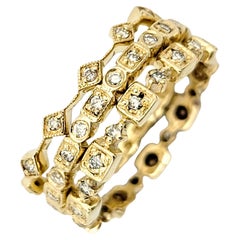 Set di 3 anelli a fascia impilabili con diamanti a grana fine in oro giallo 14 carati