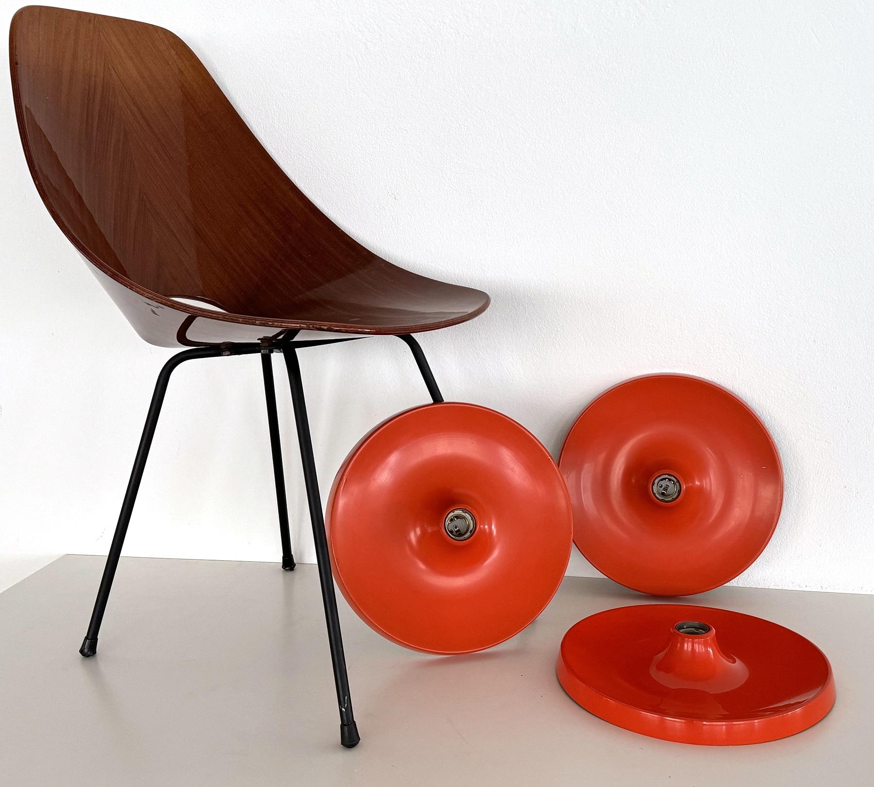 Set of 3 original disc lights from the 1970s - 1980s, Made in Germany. The lights have a diameter of 33cm (13in).
The lights are made of painted aluminum. They can be attached to the ceiling and the wall. They have E 26/27  sockets and metal