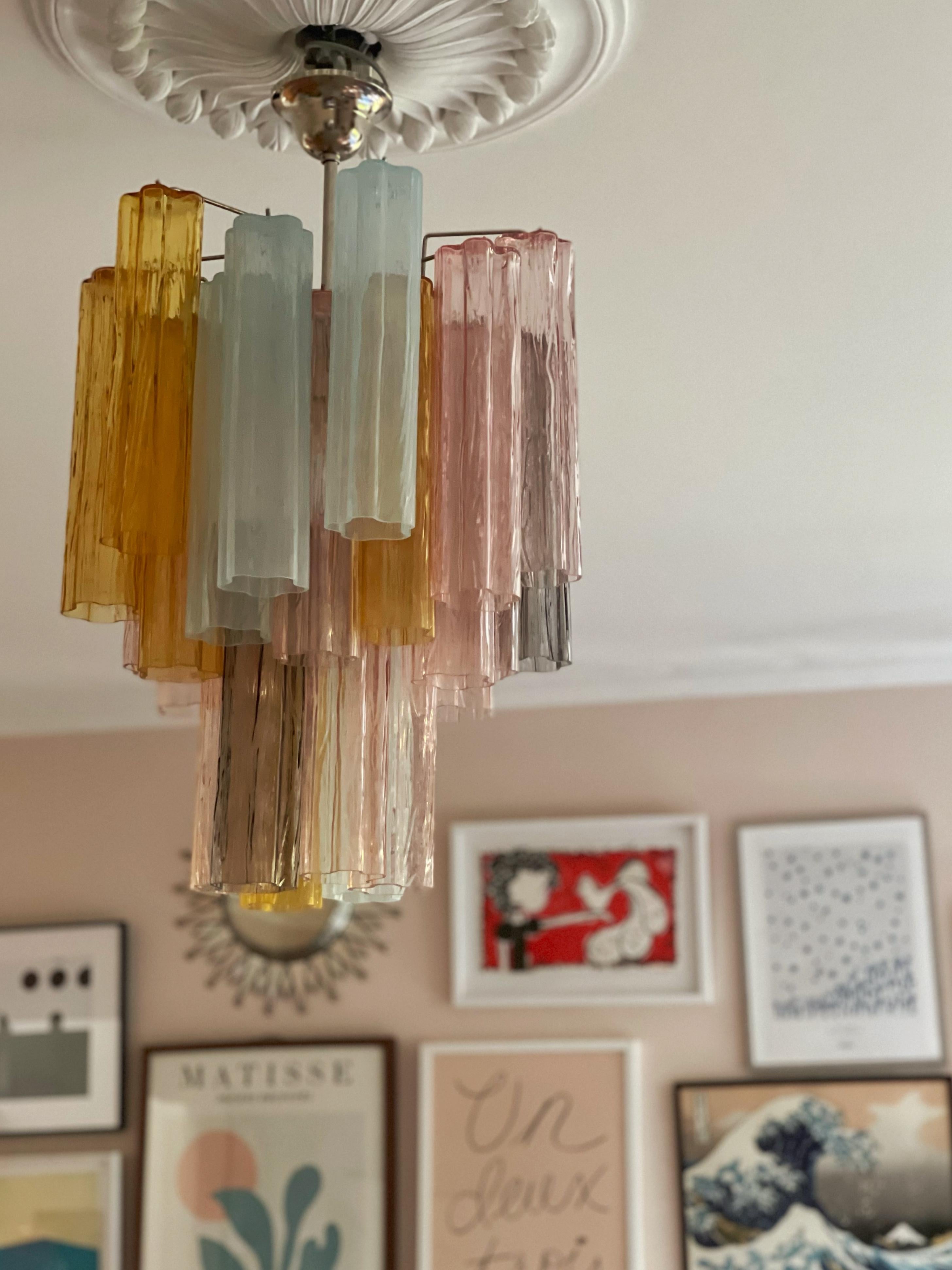 Set of three Bold Eclectic Colorful Murano Chandeliers with Tubular Glass Prisms.  Contemporary Chandeliers in Traditional Italian Mid-Century Style.
Every chandelier is composed of 30 Colored Crystal Elements in the size of 30 x7 cm (11.8