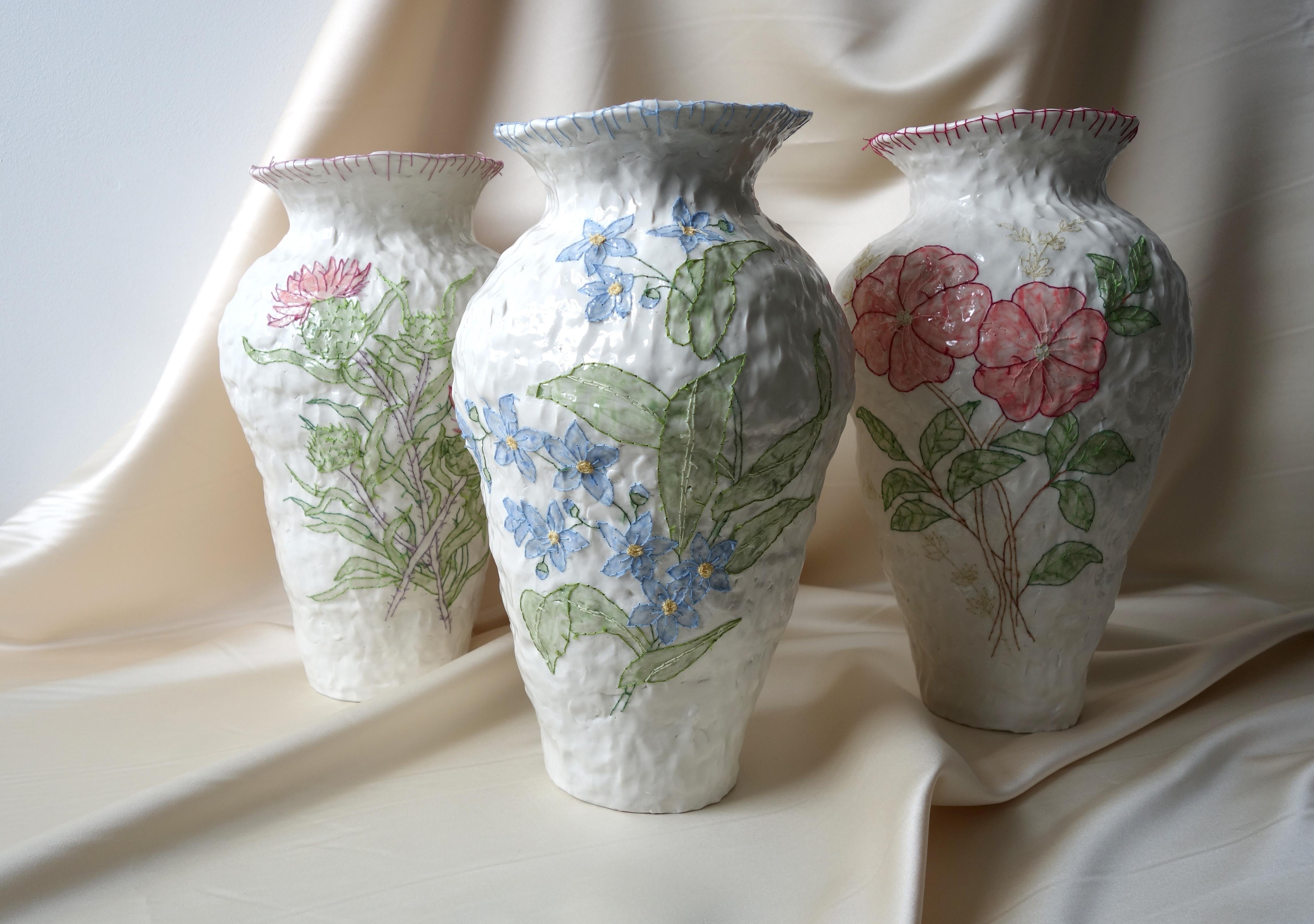 Set of 3 Emboridery Vases by Caroline Harrius
Dimensions: 45 H cm
Material: Porcelain

The pieces with emboridery is about 45 cm high, coiled in porcelain, painted with slip, glazed on the outside. After the final firing they are emboridered