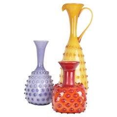 Ensemble de 3 vases Empoli en verre ciselé à motif de clous de girofle, milieu du siècle dernier