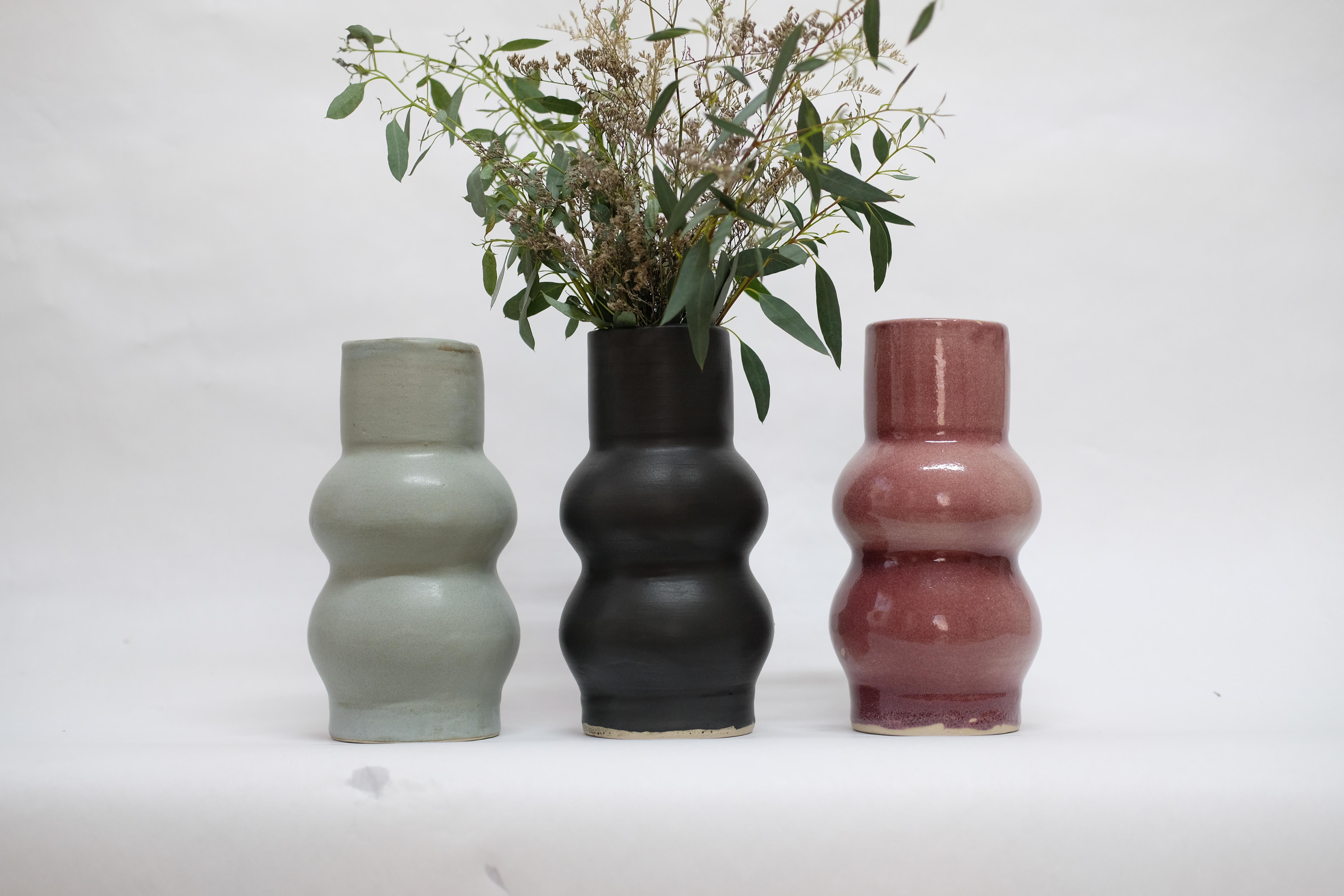 Set of 3 Femme II unique stoneware vase by Camila Apaez
Unique 
Materials: Stoneware
Dimensions: 8 x 8 x 22 cm

This year has been shaped by the topographies of our homes and the uncertainty of our time. We have found solace in the humbleness