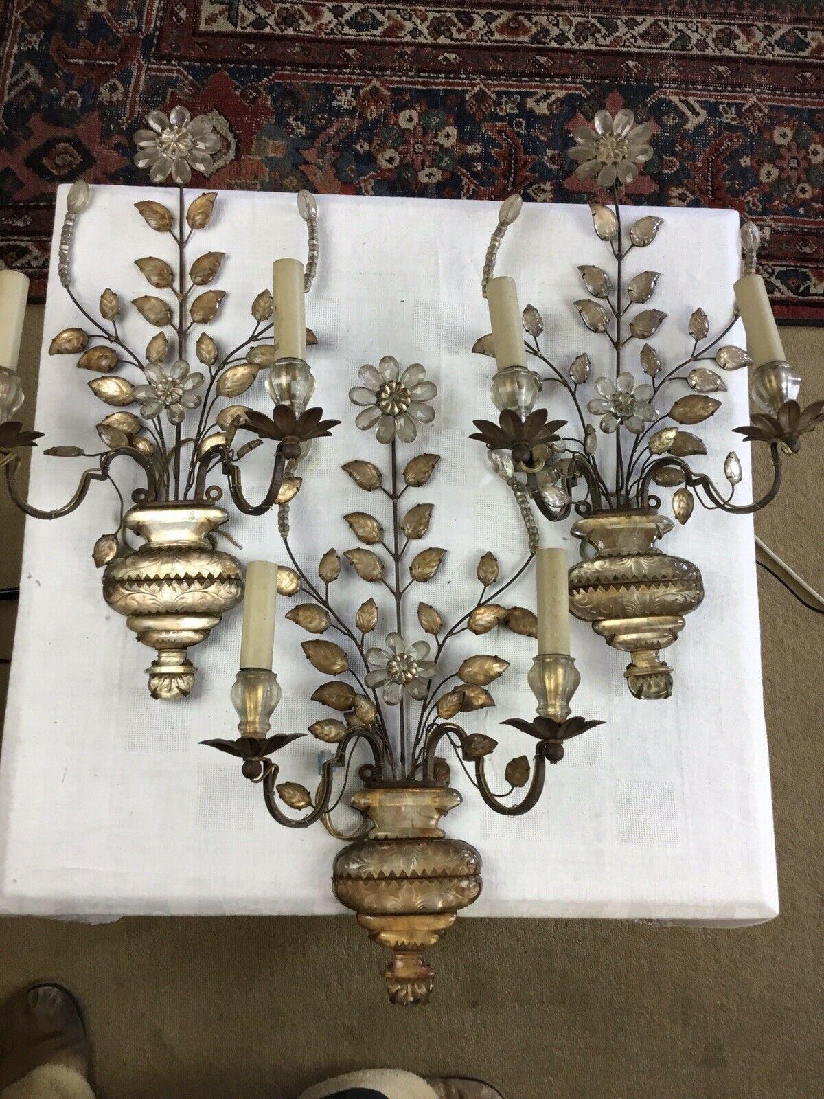 Set of 3 1920's Matching French Art Deco Crystal Floral Form Wall Sconces by Maison Bagues Paris. Cut crystal flowers in vase. These sconces were sourced from a Hotel Liquidation where they were stored since the 1960s. Amazing set!