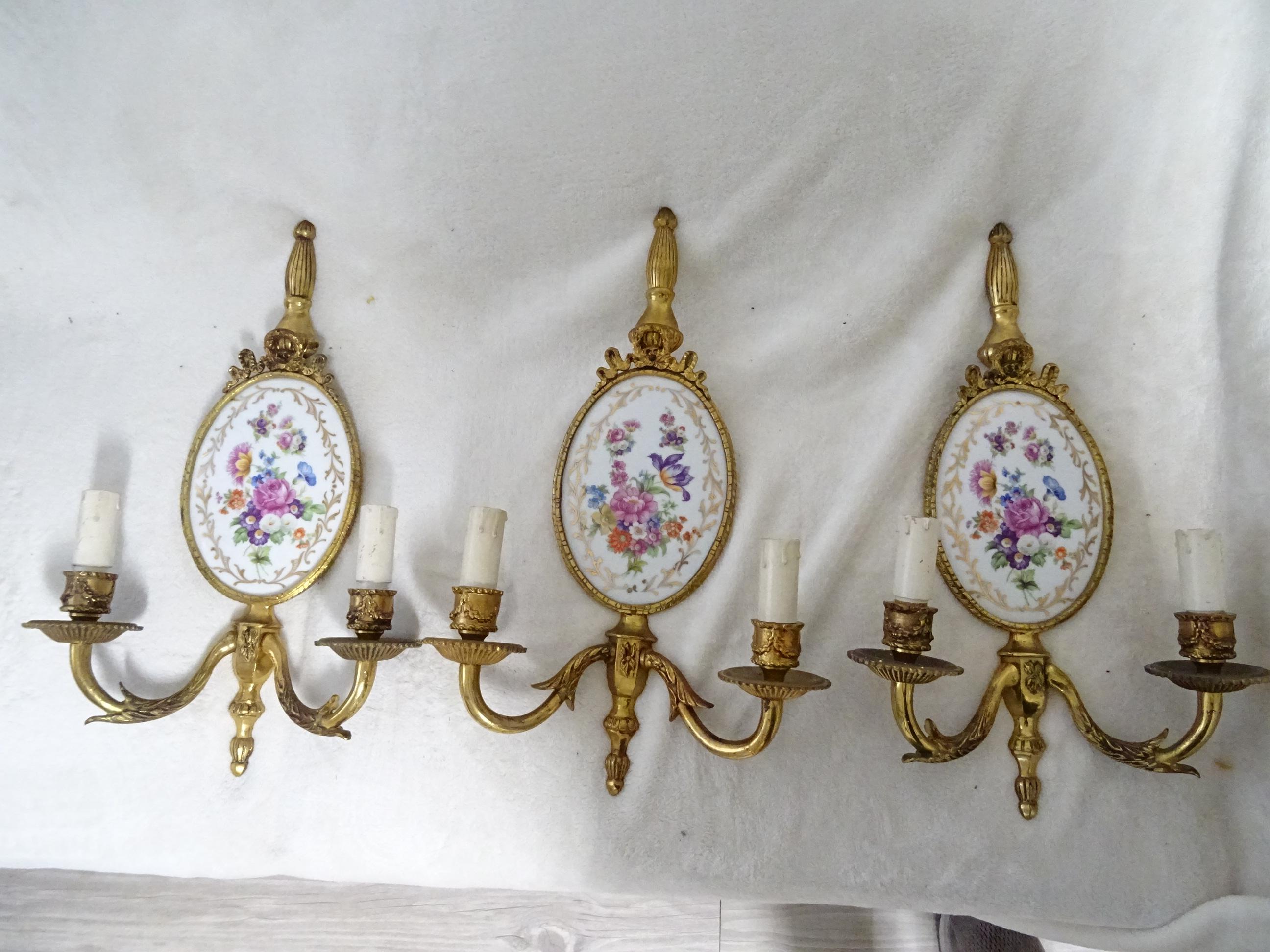 Rare set of 3. Housing two-light each, Will be rewired with certified UL US sockets for the USA, appropriate sockets for all other countries and ready to hang. Heavy bronze with great detailing and patina. Louis XIV Ormolu with gilded bronze and
