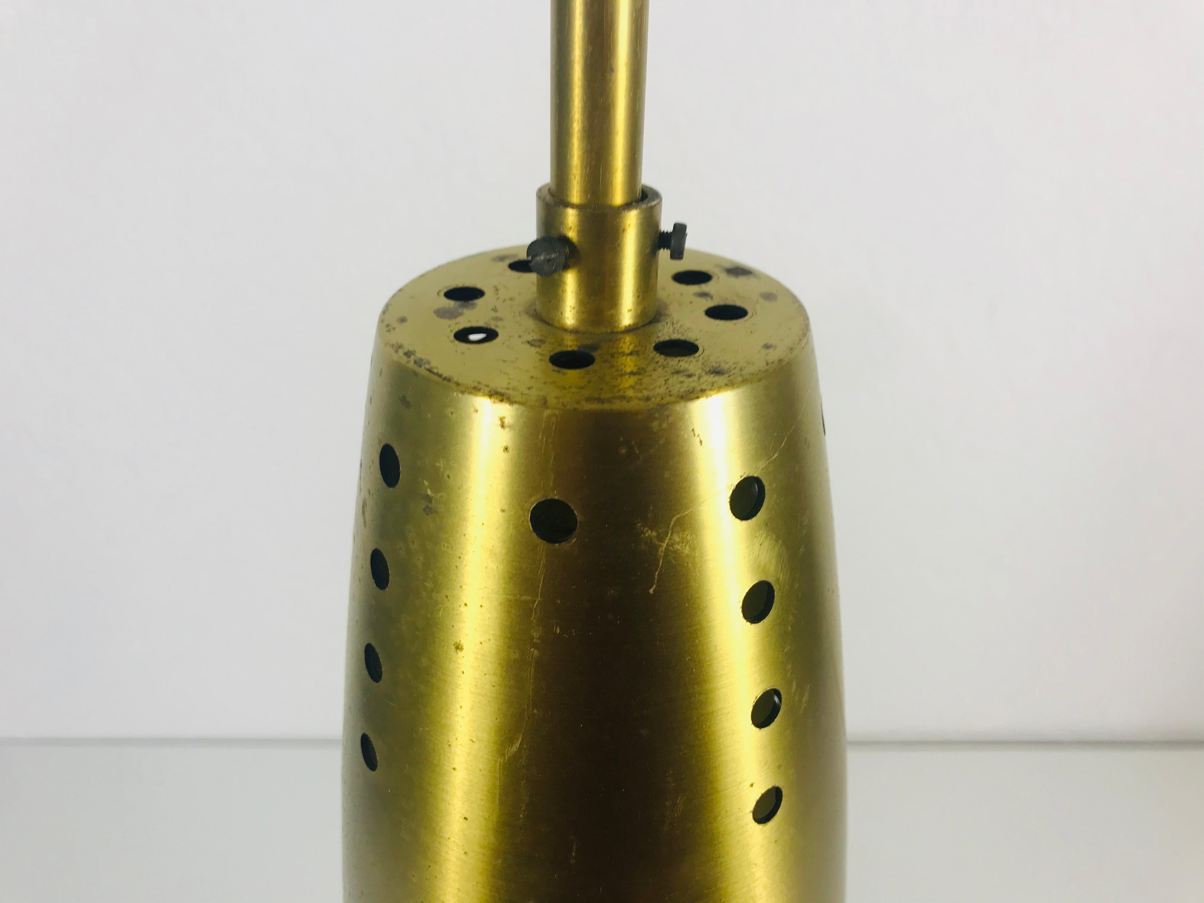 Ottone Set di 3 lampade a sospensione in ottone pieno della metà del secolo scorso, anni '50, Germania in vendita