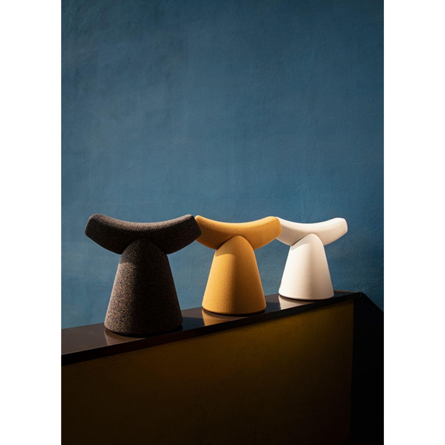 Set of 3 gardian stool by Patrick Norguet
Materials: Fabric (also available in leather)
 Handle: Noce Canaletto solid wood
Dimensions: W51.1 x D34.7 x H49.8 cm

For the Gardian stool by designer Patrick Norguet, the concept of seating was