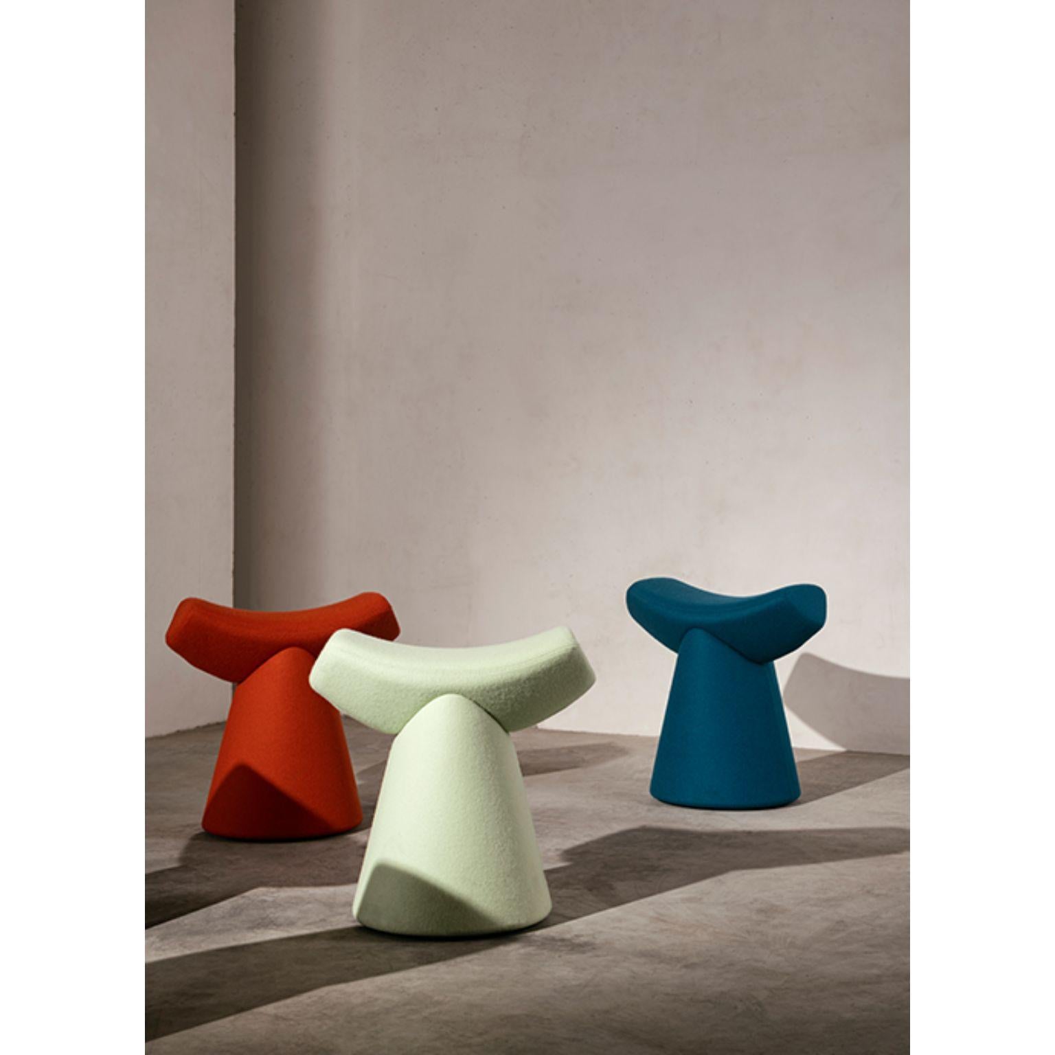Set of 3 gardian stool by Patrick Norguet
Materials: Fabric (also available in leather)
 Handle: Noce Canaletto solid wood
Dimensions: W 51.1 x D 34.7 x H 49.8 cm.

For the Gardian stool by designer Patrick Norguet, the concept of seating was