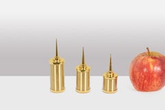 Set of 3 gilded brass candlesticks. Artisan work.
