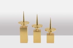 Set of 3 gilded brass candlesticks. Contemporary Work.