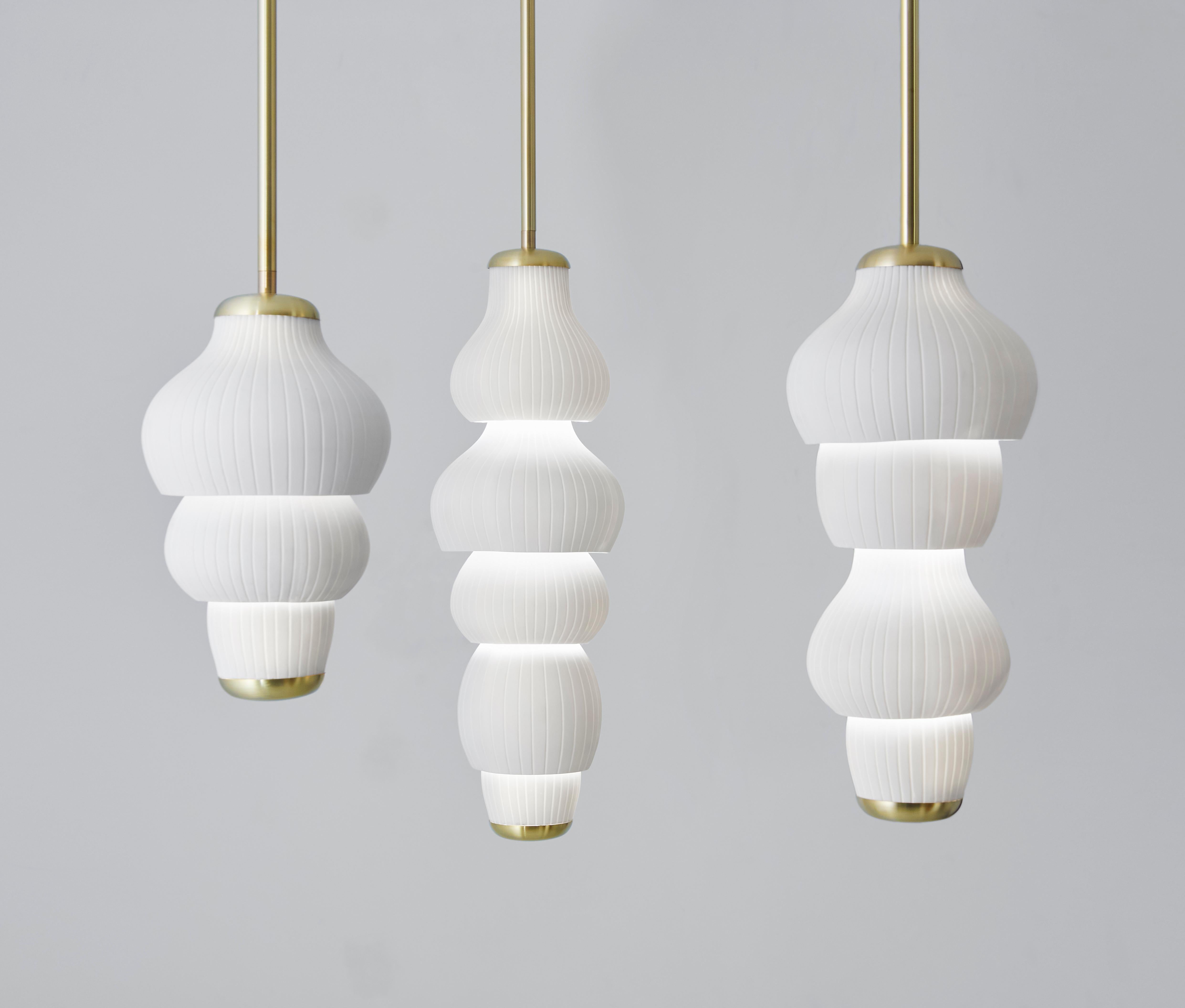 Set of 3 Glaïeul pendant Light by Mydriaz
Dimensions: D26x H100 cm each one
Materials: Brushed brass, pale gold finish, biscuit ceramic.
Adjustable measure.

All our lamps can be wired according to each country. If sold to the USA it will be
