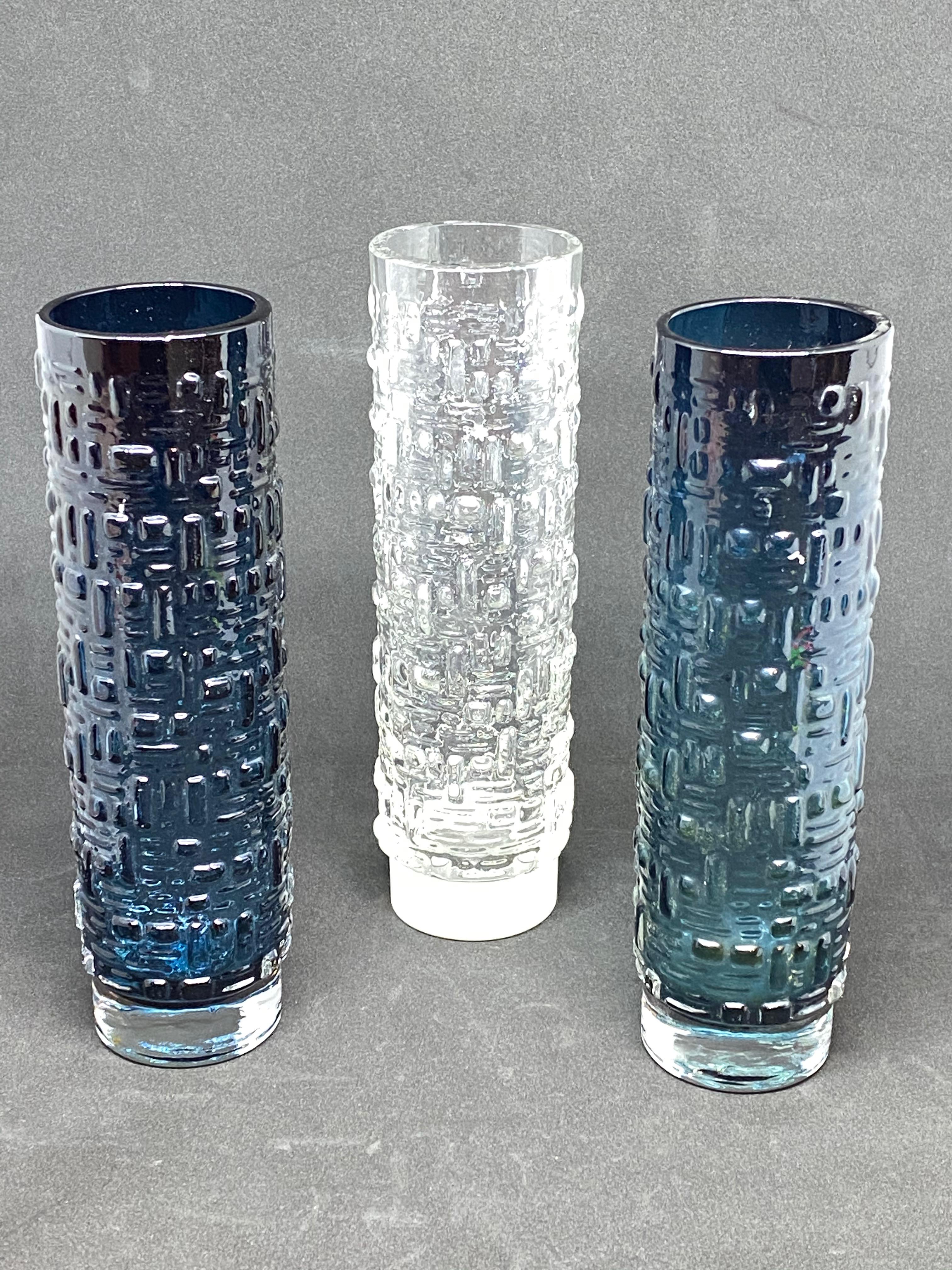 Wonderful Mid-Century Modern German vases by Gral Glass, designed by Emil Funke, circa 1970. These beautiful petrol colored and clear vases bring a touch of fun and fantasy to any room. A nice addition to any room. Each one is approximate 8 1/4