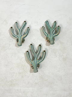 Juego de 3 apliques de terracota esmaltada, fabricados en Italia en los años 70.