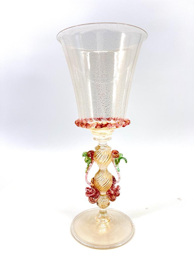 Set of three exquisitely handcrafted blown glass goblets from Murano adorned with delicate 24k gold leaf embellishments.

The meticulous crafting of each stem, featuring intricate floral designs, classic blown stems, and detailed embroidery, imparts