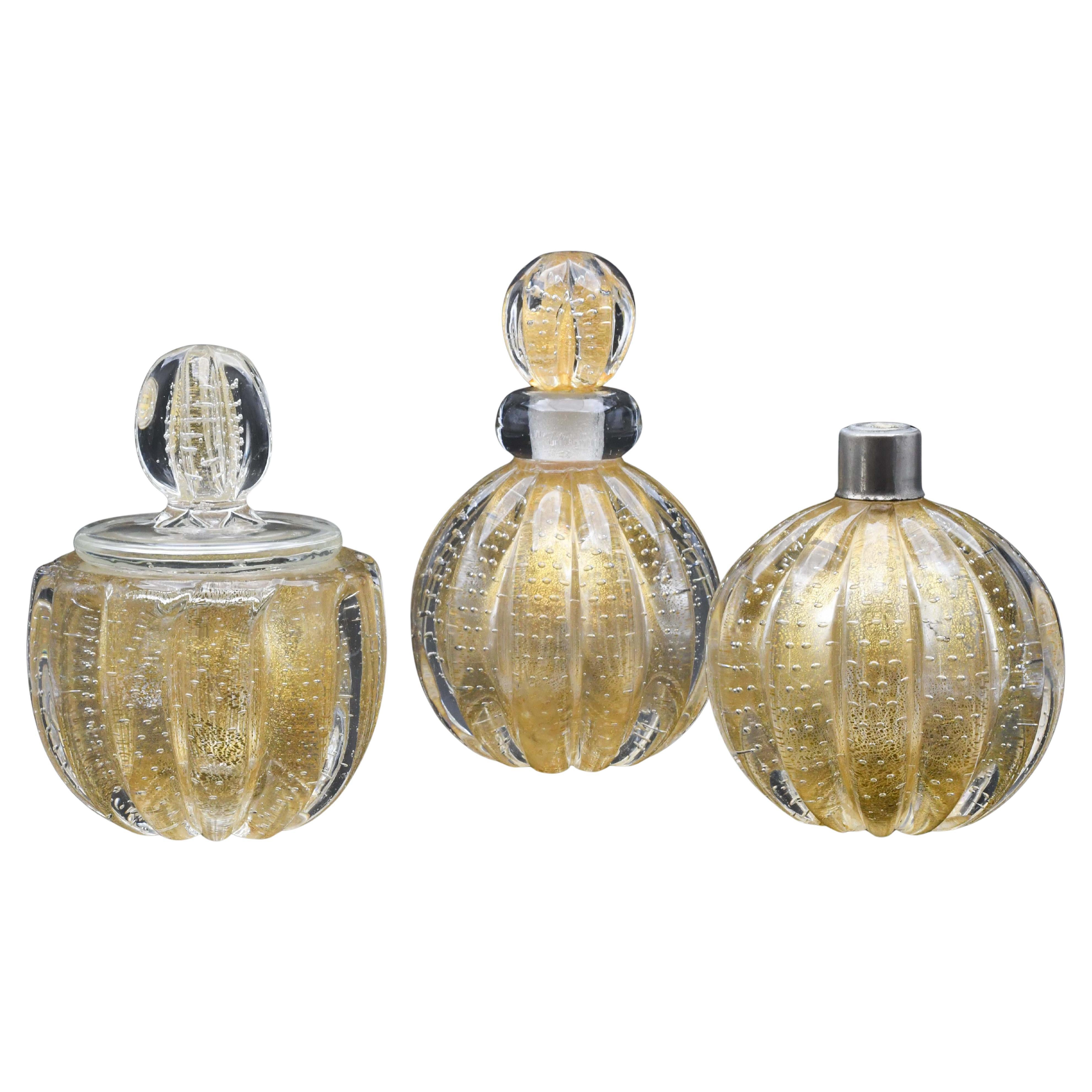 Ensemble de 3 vases en verre de Murano "Bullicante" doré d
Ercole Barovier pour Barovier 
Toso