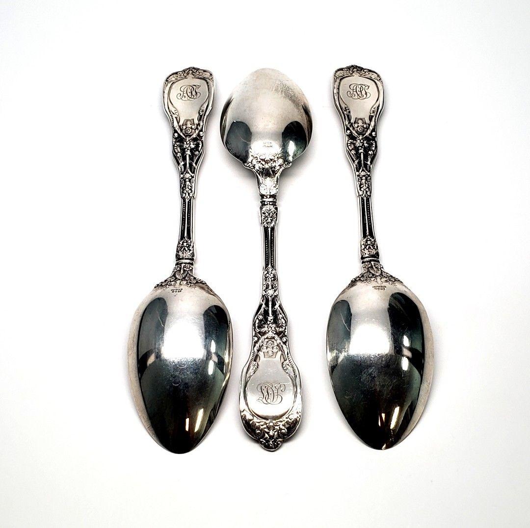 Set of 3 Gorham Mythologique sterling silver serving spoons. Mythologique is a multiple motif pattern, this one is the old no bead border, no face bowl. Monogram appears to be APS. Measures approximate 8 5/8