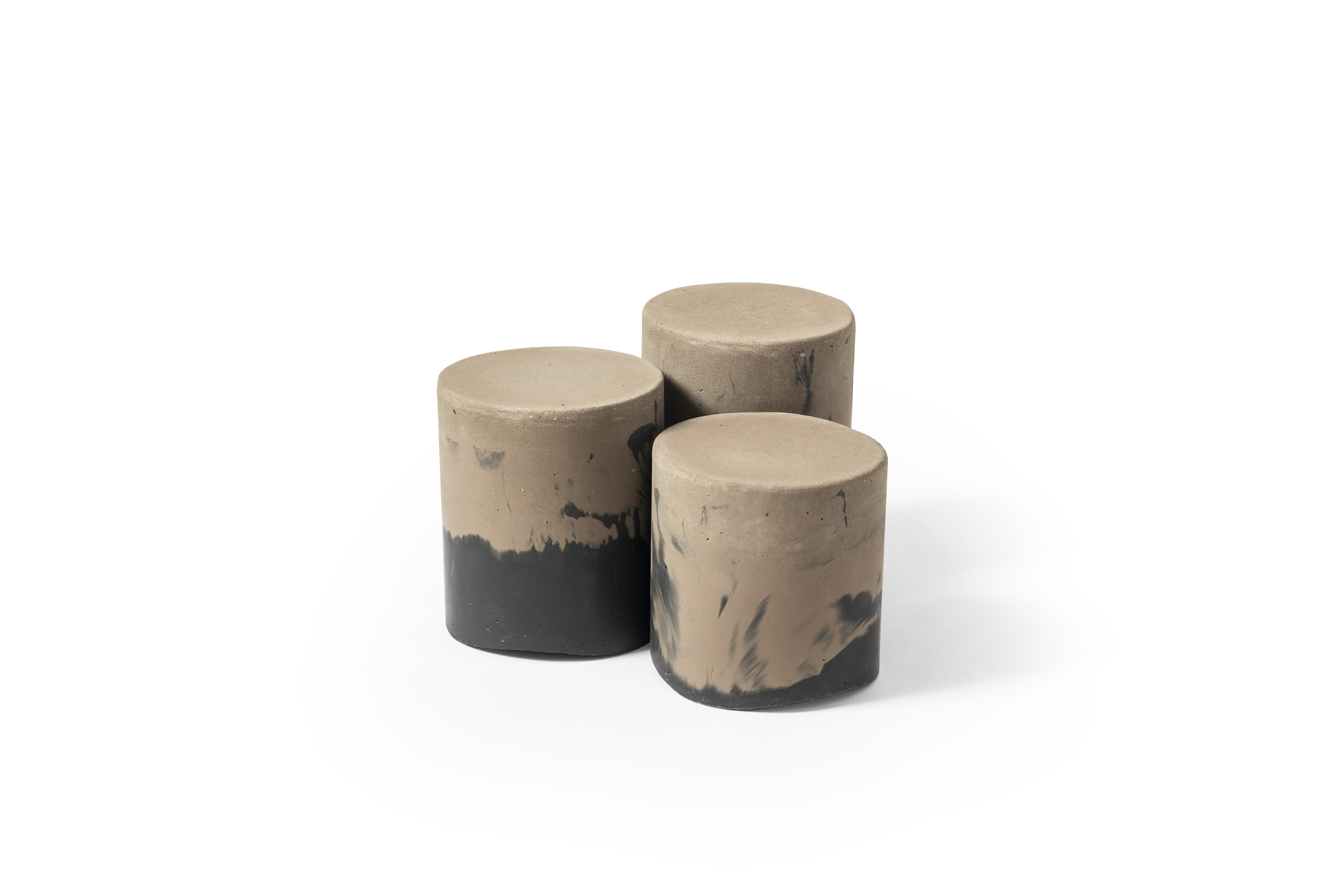 Set of 3 Gwened Coffee Table by RALPH M
Dimensions: Large: W 32 x D 32 x H 40 cm.
Medium: W 32 x D 32 x H 36 cm.
Small: W 32 x D 32 x H 32 cm.
Materials: Stone. 

Details:
Composition: Made from marine sediments.
Finish: Waterproofed with linseed