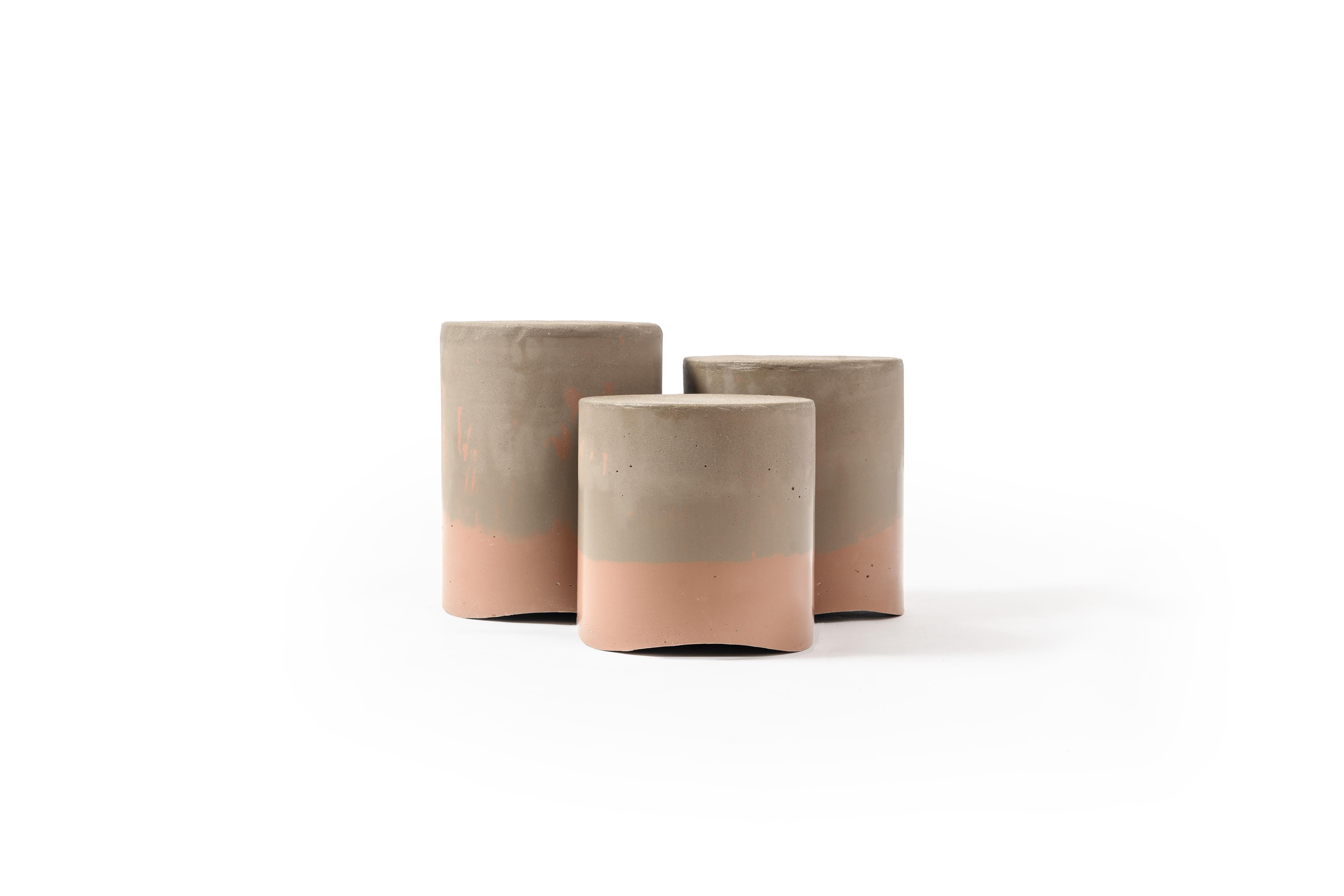 Set of 3 Gwened Coffee Table by RALPH M
Dimensions: Large: W 32 x D 32 x H 40 cm. 
Medium: W 32 x D 32 x H 36 cm
Small: W 32 x D 32 x H 32 cm
Materials: Stone. 

Details:
Composition: Made from marine sediments.
Finish: Waterproofed with linseed