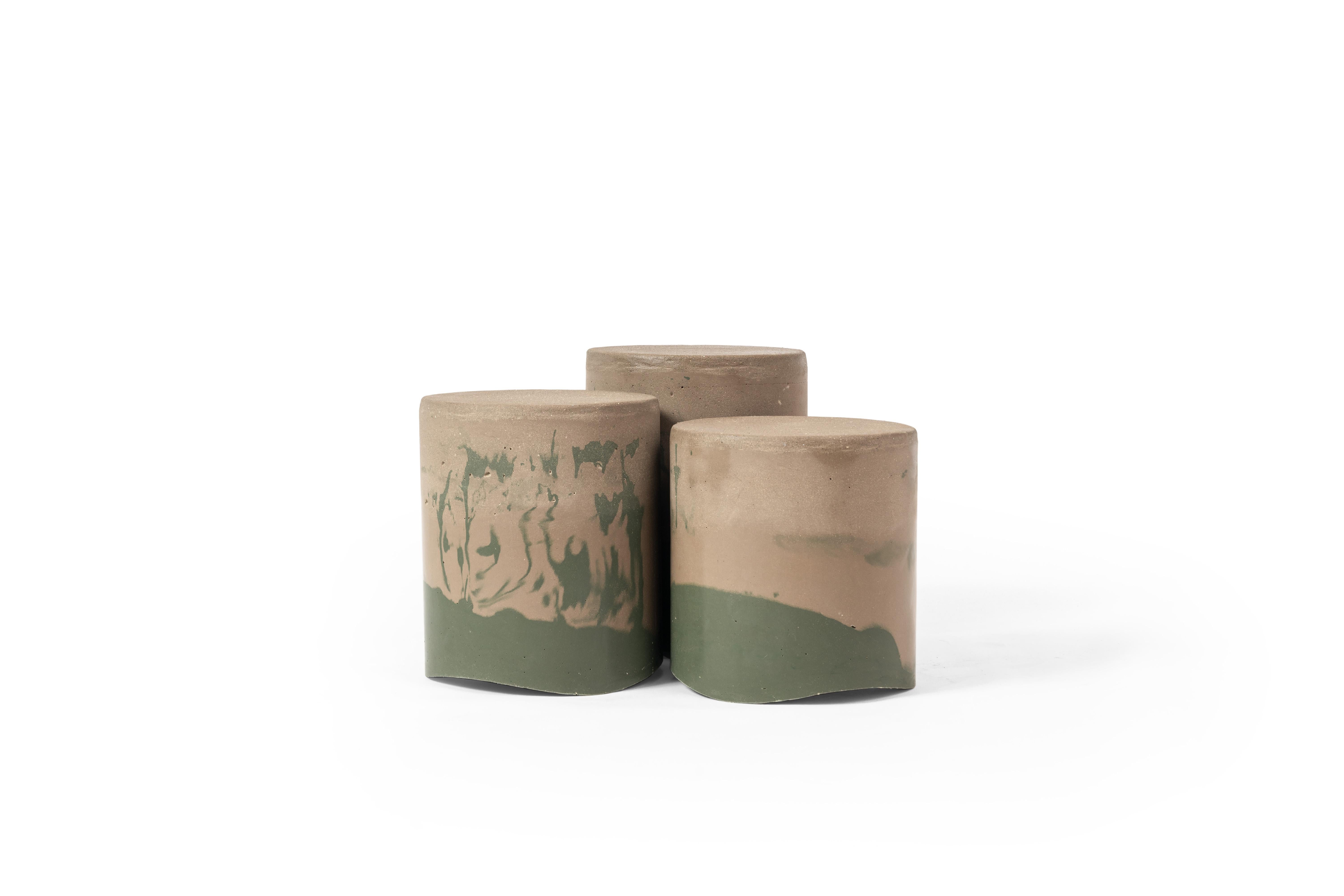 Set of 3 Gwened Coffee Table by RALPH M
Dimensions: Large: W 32 x D 32 x H 40 cm. 
Medium: W 32 x D 32 x H 36 cm
Small: W 32 x D 32 x H 32 cm
Materials: Stone. 

Details:
Composition: Made from marine sediments.
Finish: Waterproofed with linseed