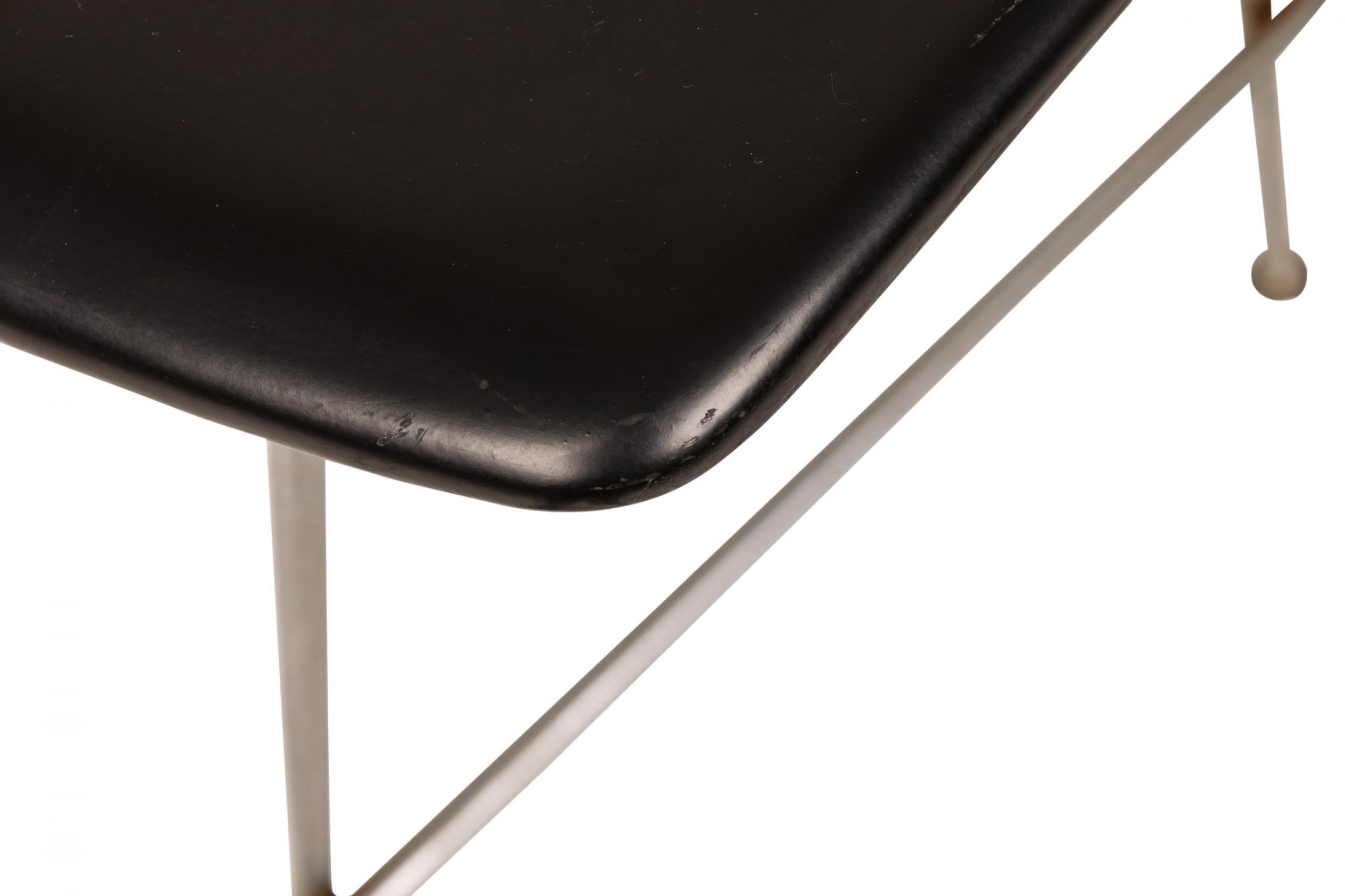 Set of 3 Mid-Century American (1960s) curved, concave barstools with black fiberglass 